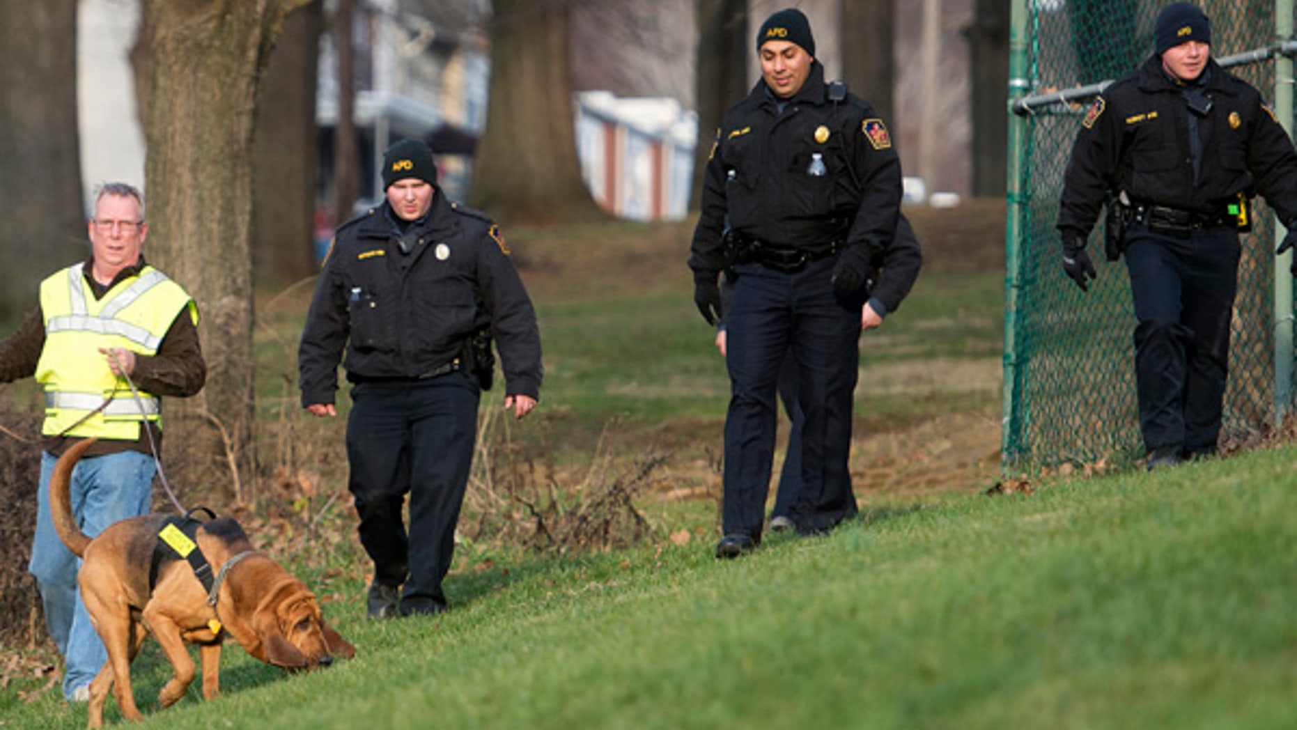 In this Friday, Jan. 1, 2016, photo, Allentown, Pa., police use a search and rescue dog in Keck Park as the search continues for Jayliel Vega Batista, a missing 5-year-old autistic boy who wandered off from a New Year's Eve party on Thursday night. (Chris Shipley/The Morning Call via AP)