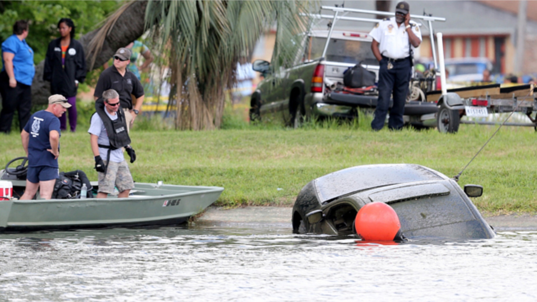 June 8, 2013: The Honda Accord belonging to teacher Terrilynn Monette, who has been missing since leaving a nearby bar in early March, is pulled from Bayou St. John by the Harrison Avenue Bridge in New Orleans.