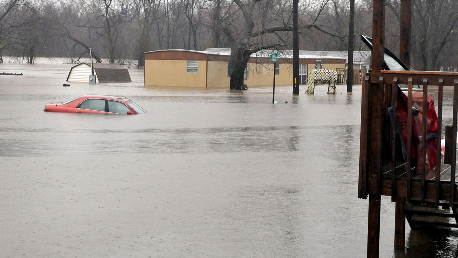 Dec. 27, 2015: The Spring River floods homes in Kendricktown, Mo. (Willie Brown/The Joplin Globe via AP)