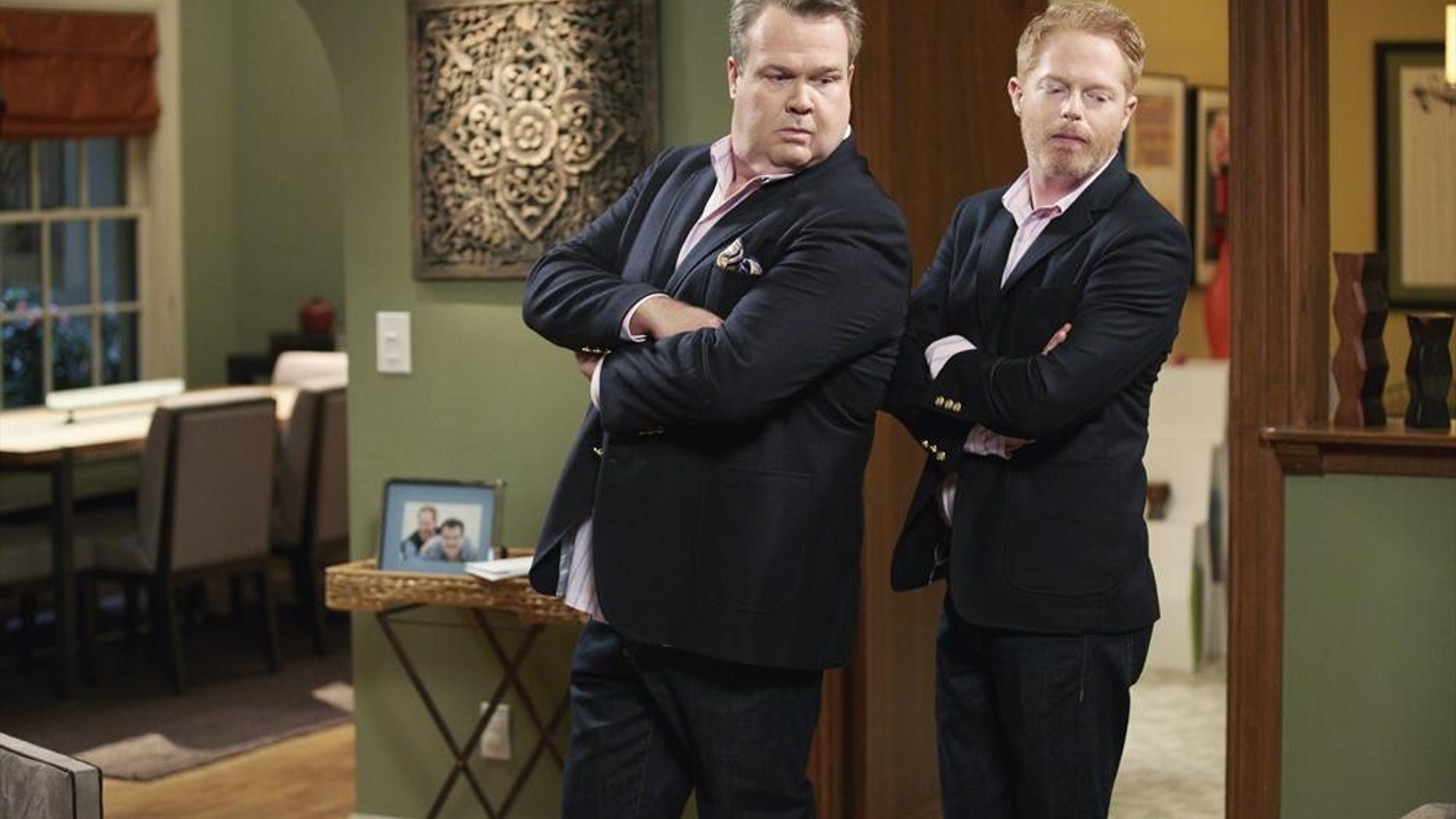 Eric Stonestreet and Jesse Tyler Ferguson play gay couple Mitch and Cam on ABC's "Modern Family."