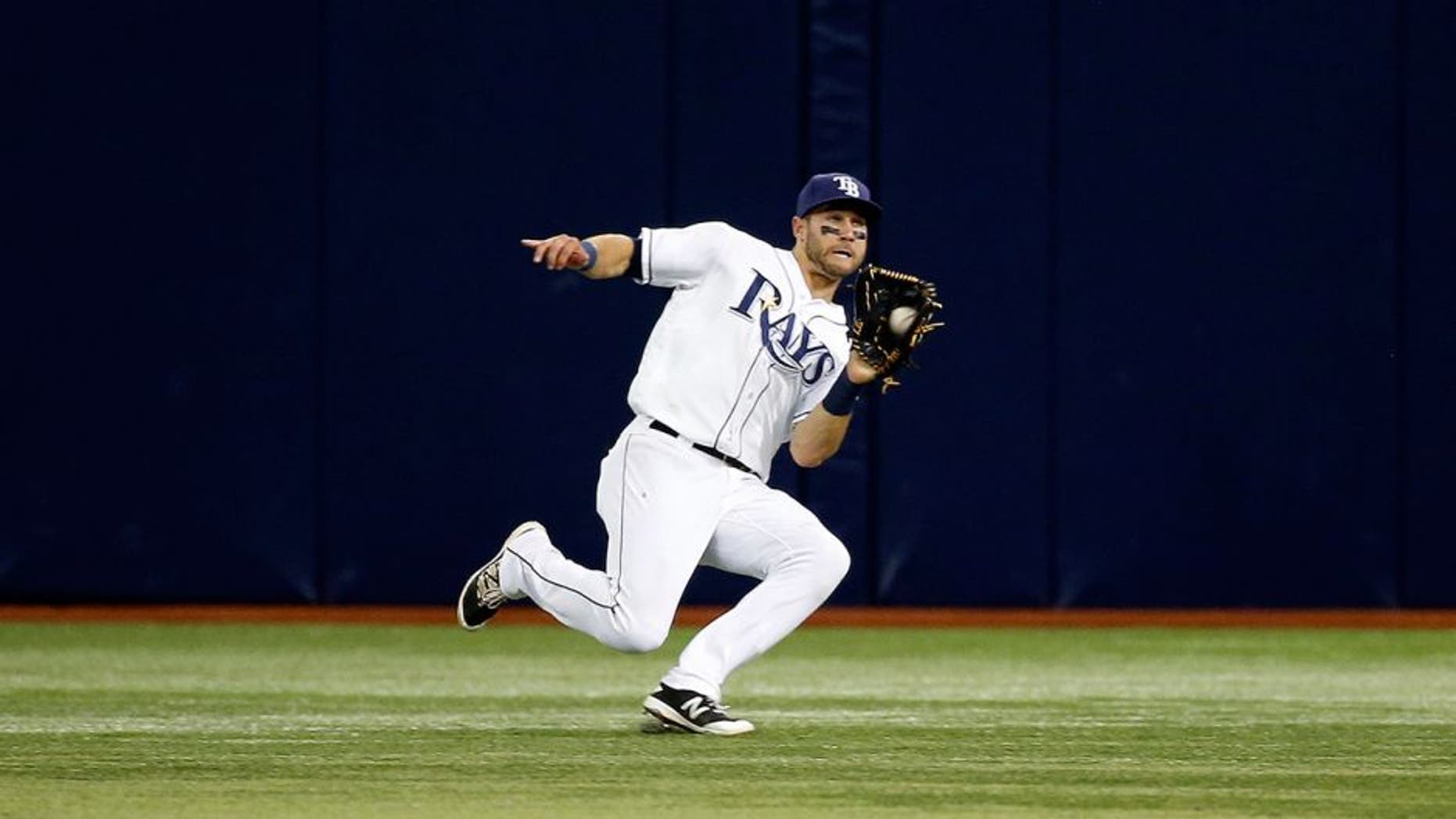Apr 25, 2016; St. Petersburg, FL, USA; Tampa Bay Rays center fielder Kevin Kiermaier (39) catches a fly ball during the ninth inning against the Baltimore Orioles at Tropicana Field. Tampa Bay Rays defeated the Baltimore Orioles 2-0. Mandatory Credit: Kim Klement-USA TODAY Sports