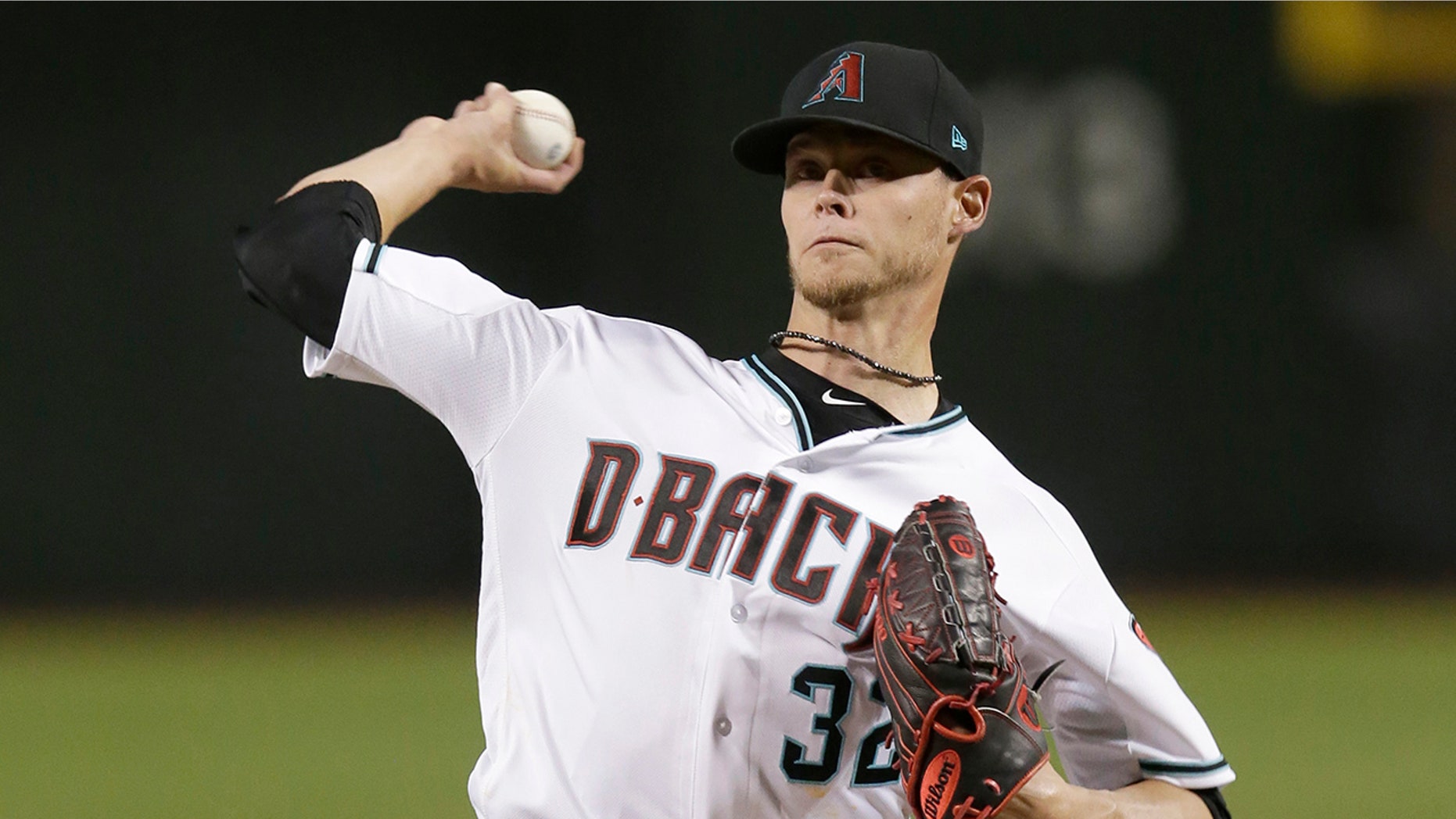 Arizona Diamondbacks pitcher Clay Buchholz throws during the first inning of the team's baseball game against the Pittsburgh Pirates.