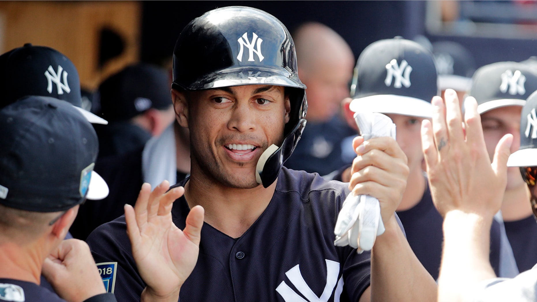 The face of slugger Giancarlo Stanton (pictured) was among those to appear in beer foam at a media event at the stadium Monday.