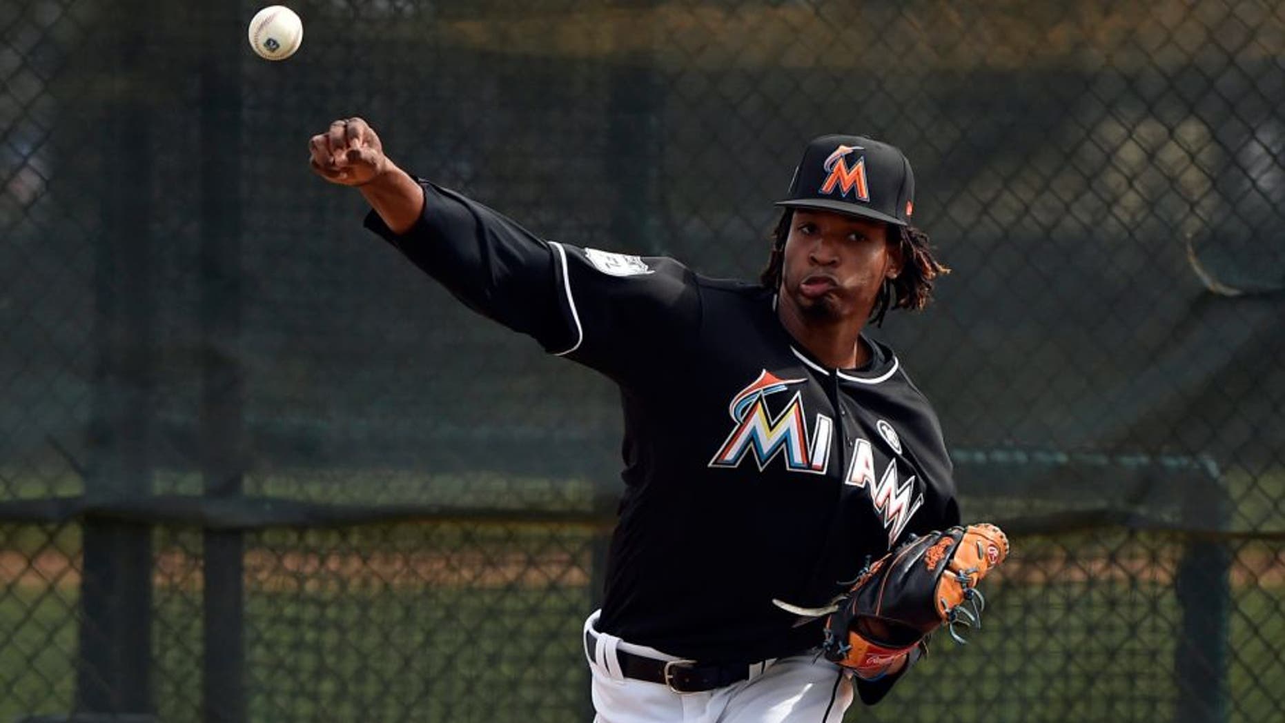 Feb 16, 2017; Ju, FL, USA; Miami Marlins relief pitcher Jose Urena (62) throws during spring training drills at Roger Dean Stadium. Mandatory Credit: Steve Mitchell-USA TODAY Sports