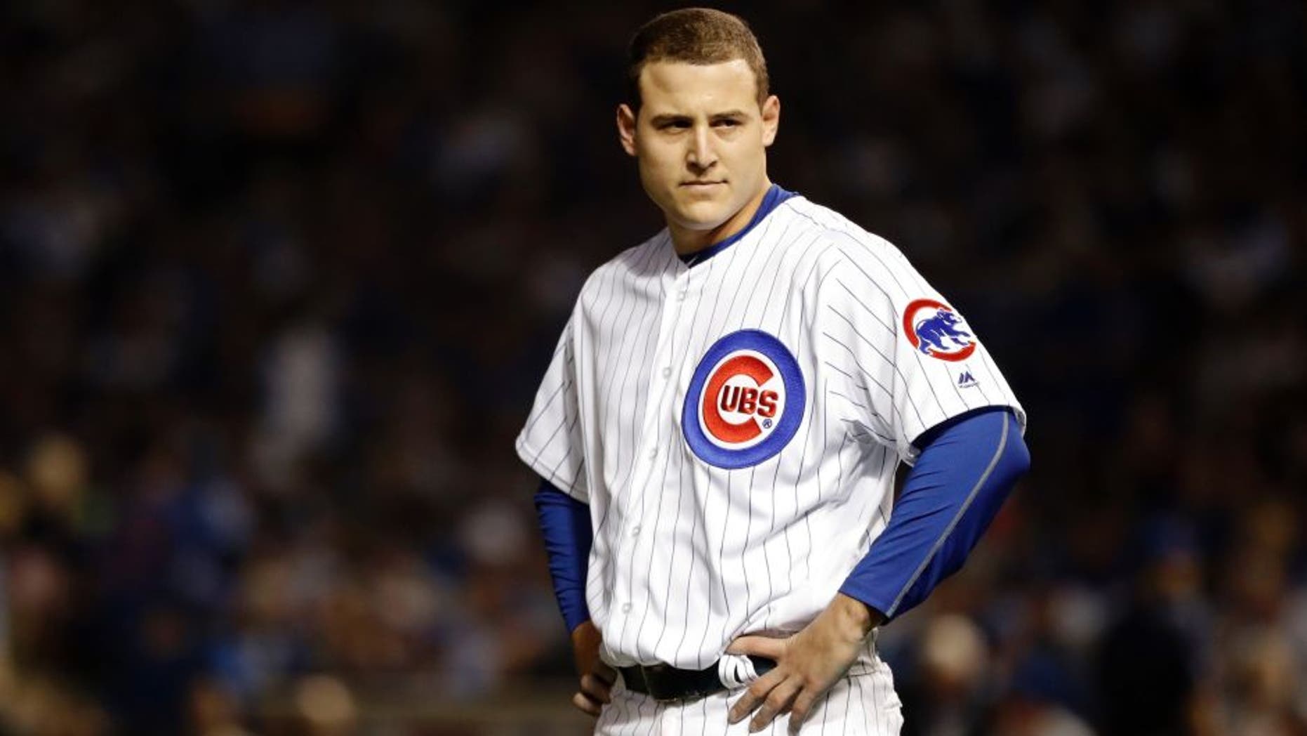 Oct 16, 2016; Chicago, IL, USA; Chicago Cubs first baseman Anthony Rizzo (44) reacts after hitting a pop fly during the first inning against the Los Angeles Dodgers in game two of the 2016 NLCS playoff baseball series at Wrigley Field. Mandatory Credit: Jon Durr-USA TODAY Sports