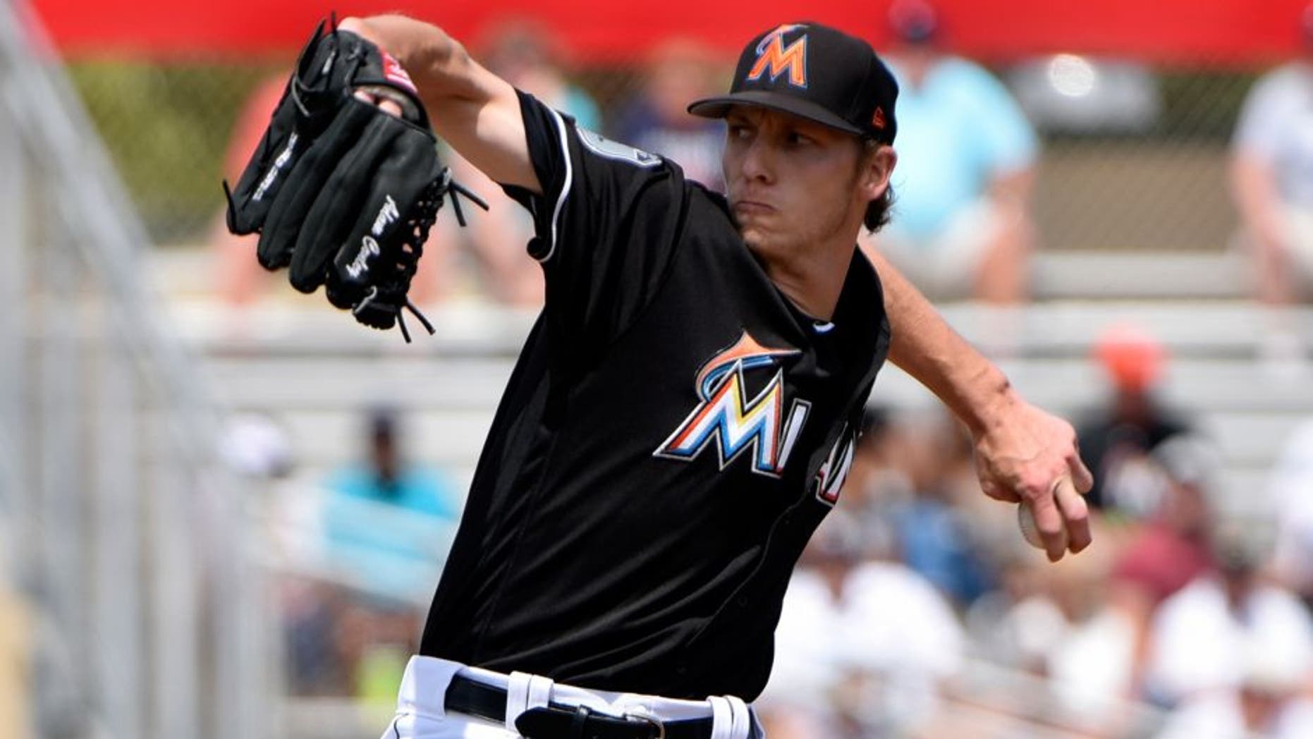 Mar 14, 2017; Jupiter, FL, USA; Miami Marlins starting pitcher Adam Conley (61) delivers a pitch during a spring training game against the Detroit Tigers at Roger Dean Stadium. Mandatory Credit: Steve Mitchell-USA TODAY Sports