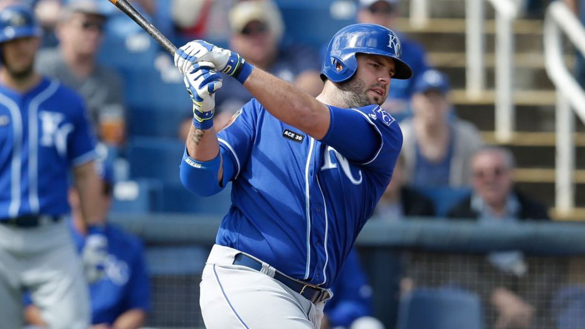 Feb 28, 2017; Phoenix, AZ, USA; Kansas City Royals third baseman Mike Moustakas (8) during a spring training game against the Milwaukee Brewers at Maryvale Baseball Park. Mandatory Credit: Rick Scuteri-USA TODAY Sports