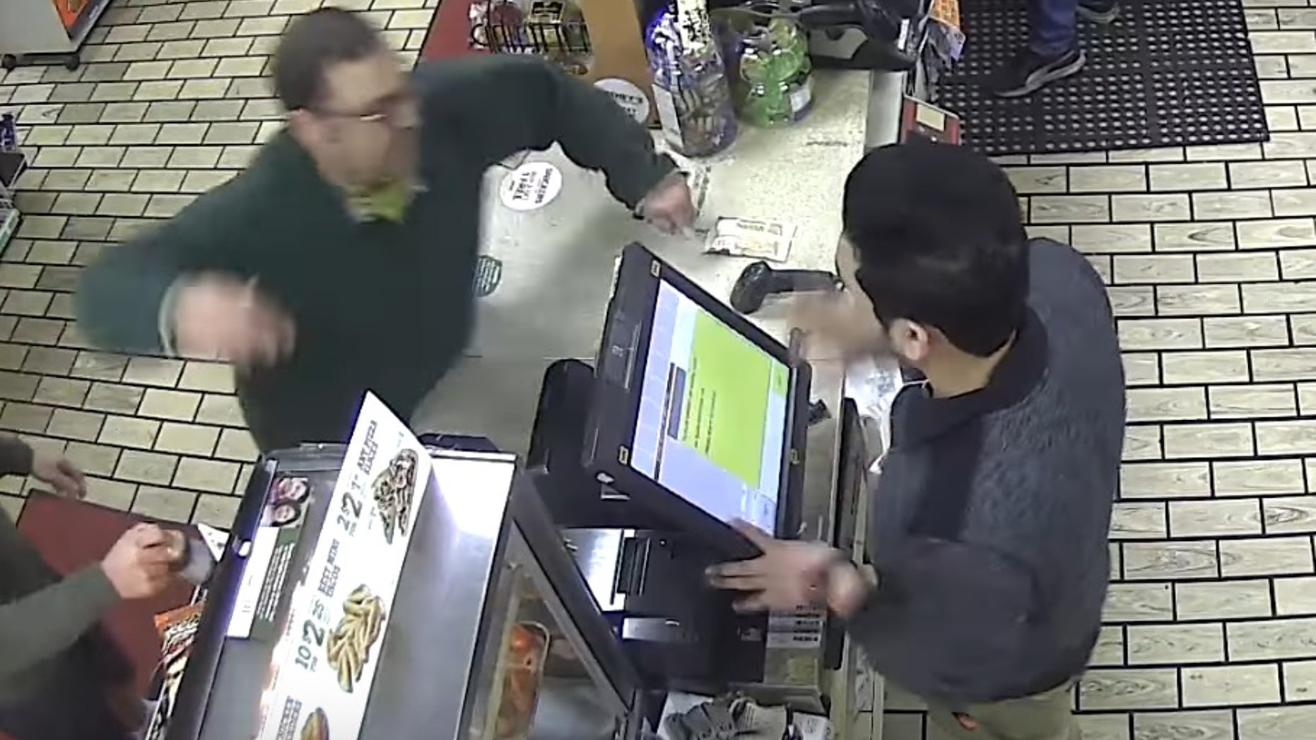 The customer throwing a punch.