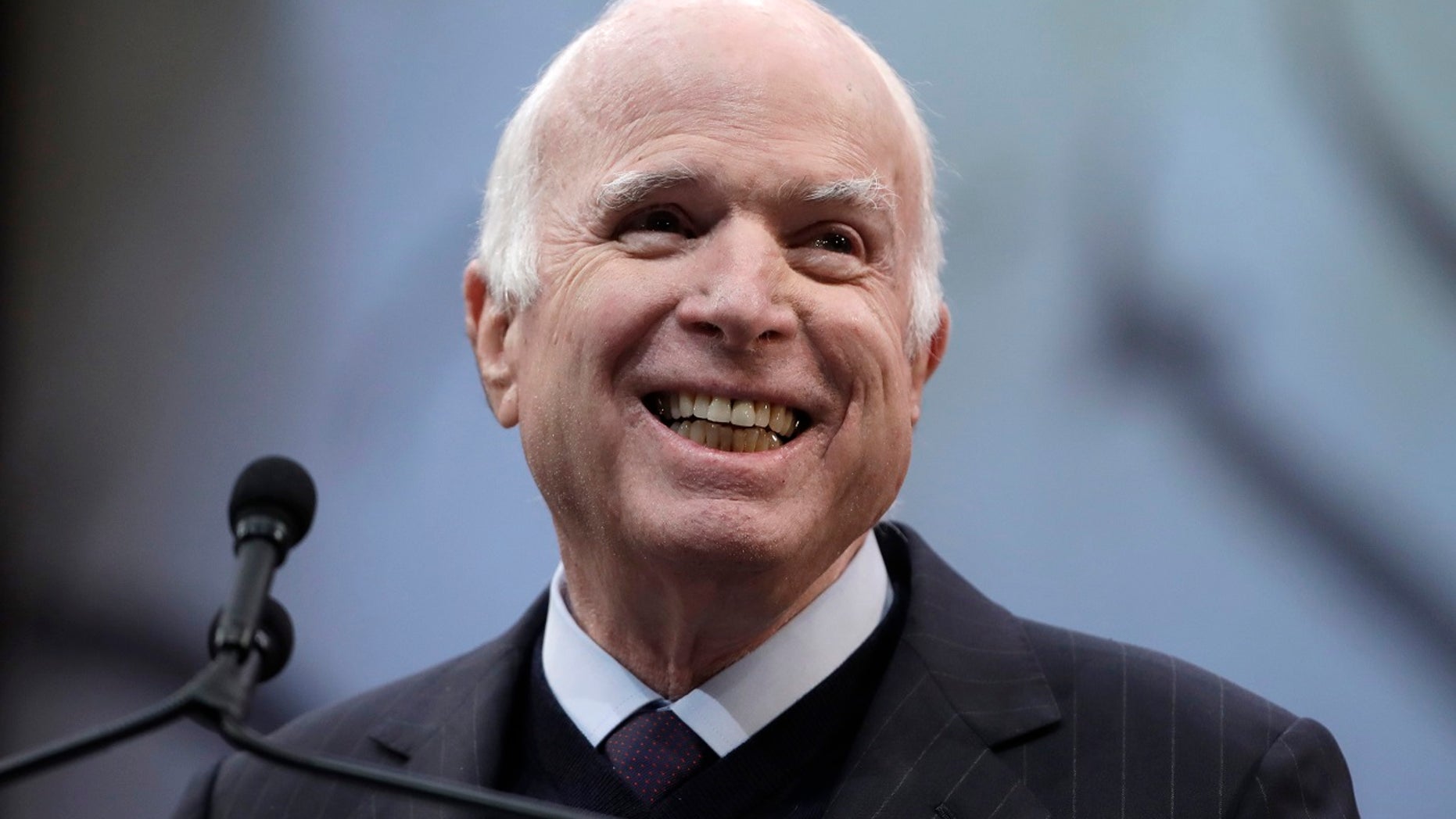 Sen. John McCain, R-Ariz., said in his upcoming memoir that he doesn't want to be buried at Arlington National Cemetery, but next to his old Navy pal Chuck Larson.