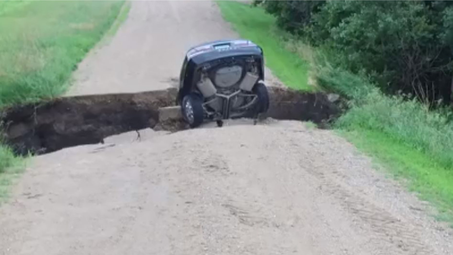 A Minnesota teen survived driving into a sinkhole.