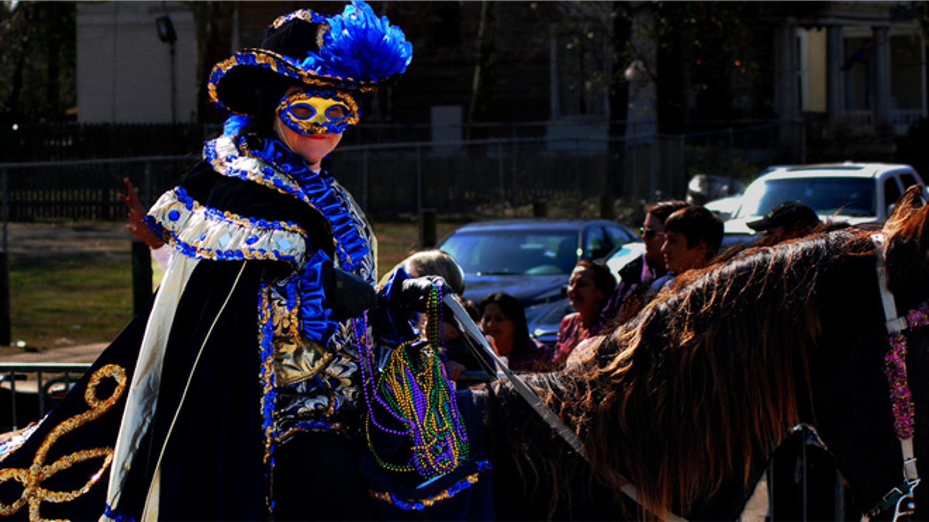 One of the 1.3 million people take part in Mobile's Carnival festivities.