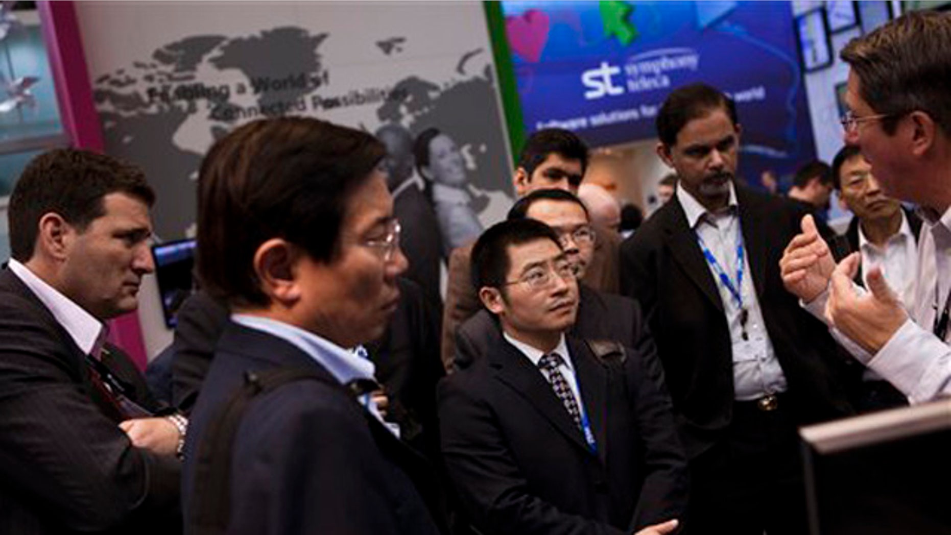 March 1, 2012: Visitors attend a briefing at the world's largest mobile phone trade show in Barcelona, Spain.