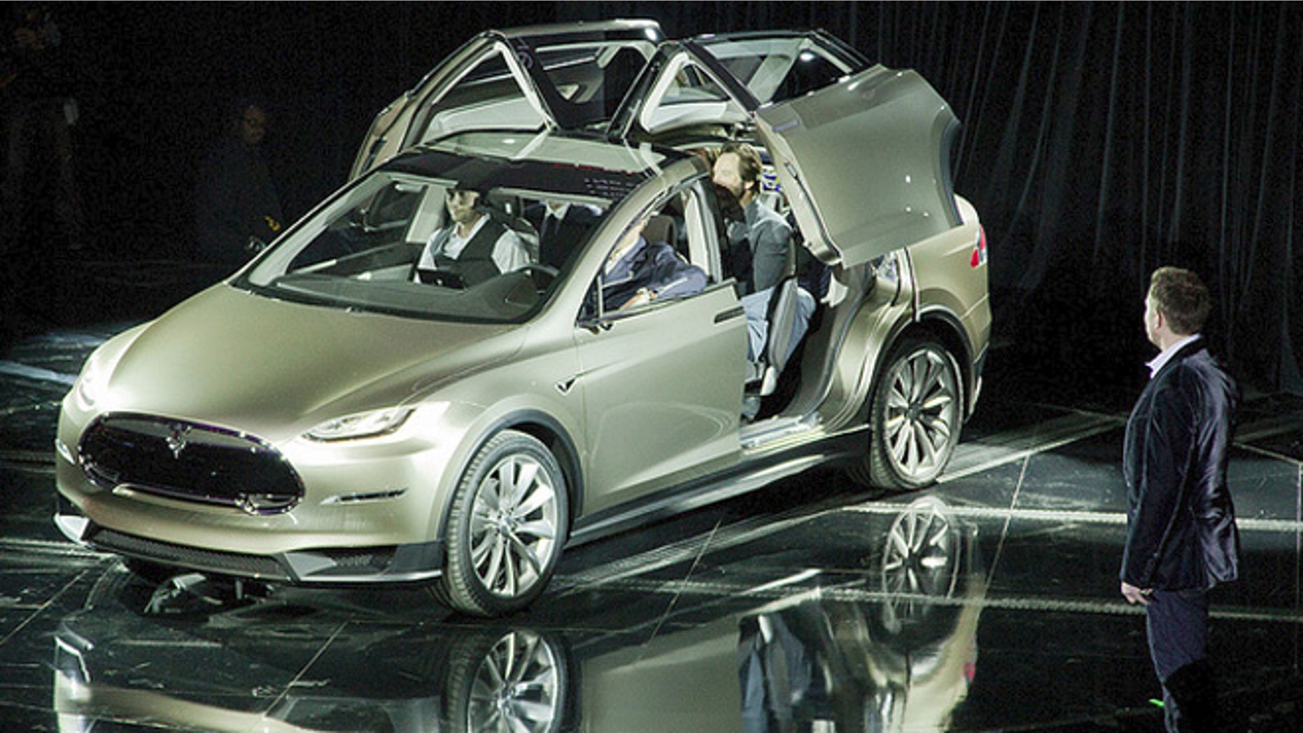 Elon Musk reveals Tesla Model X crossover concept
