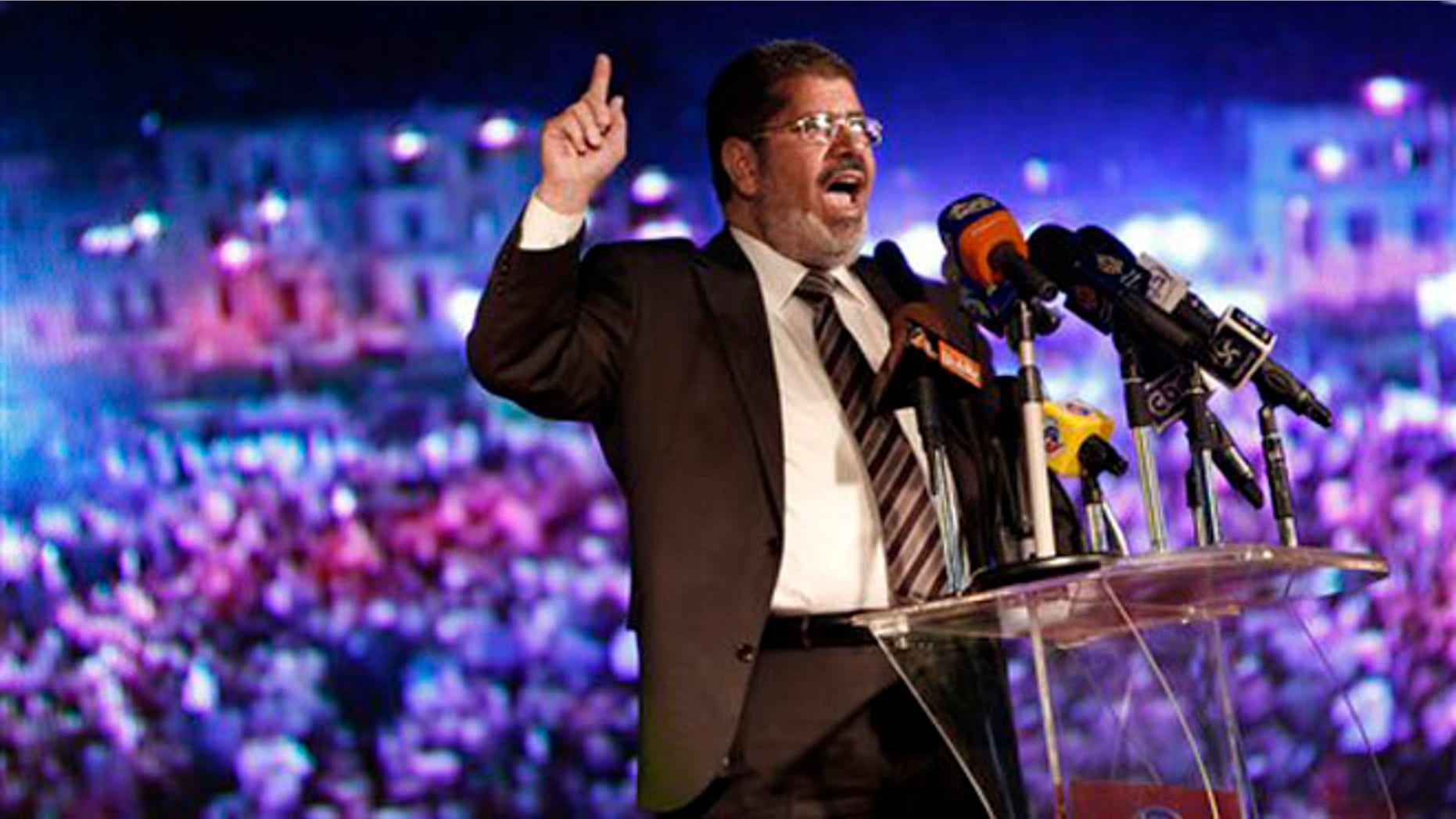 May 20, 2012: In this file photo, Muslim Brotherhood's president-elect Mohammed Morsi speaks at his last rally in Cairo, Egypt.