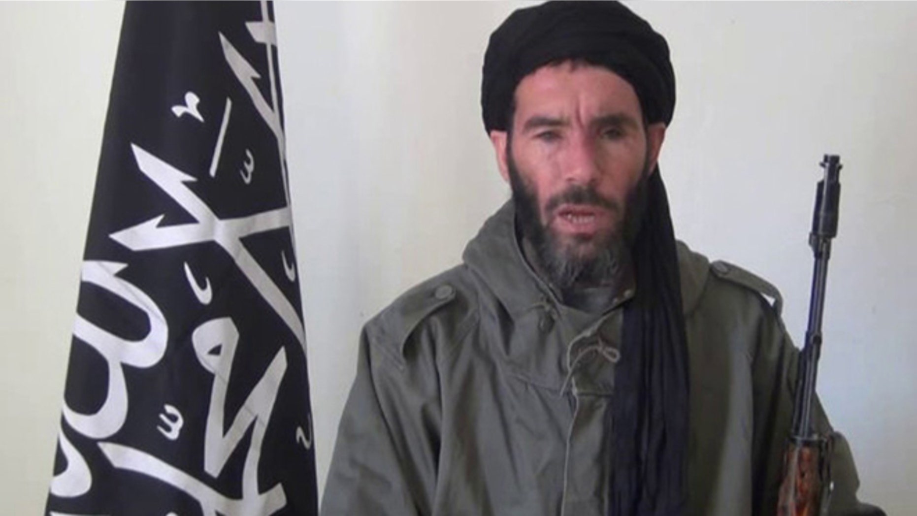 Jan. 17, 2013: In this undated file image taken from video provided by the SITE Intel Group and made available, purports to show terrorist leader Moktar Belmoktar. The one-eyed terror leader Moktar Belmoktar, who is considered by many to be the most dangerous man in the Sahara, is now officially joining forces with a Mali-based jihadist group and vowing to stage attacks in Egypt, according to a statement posted Thursday, Aug. 22, 2013 on a Mauritanian web site.