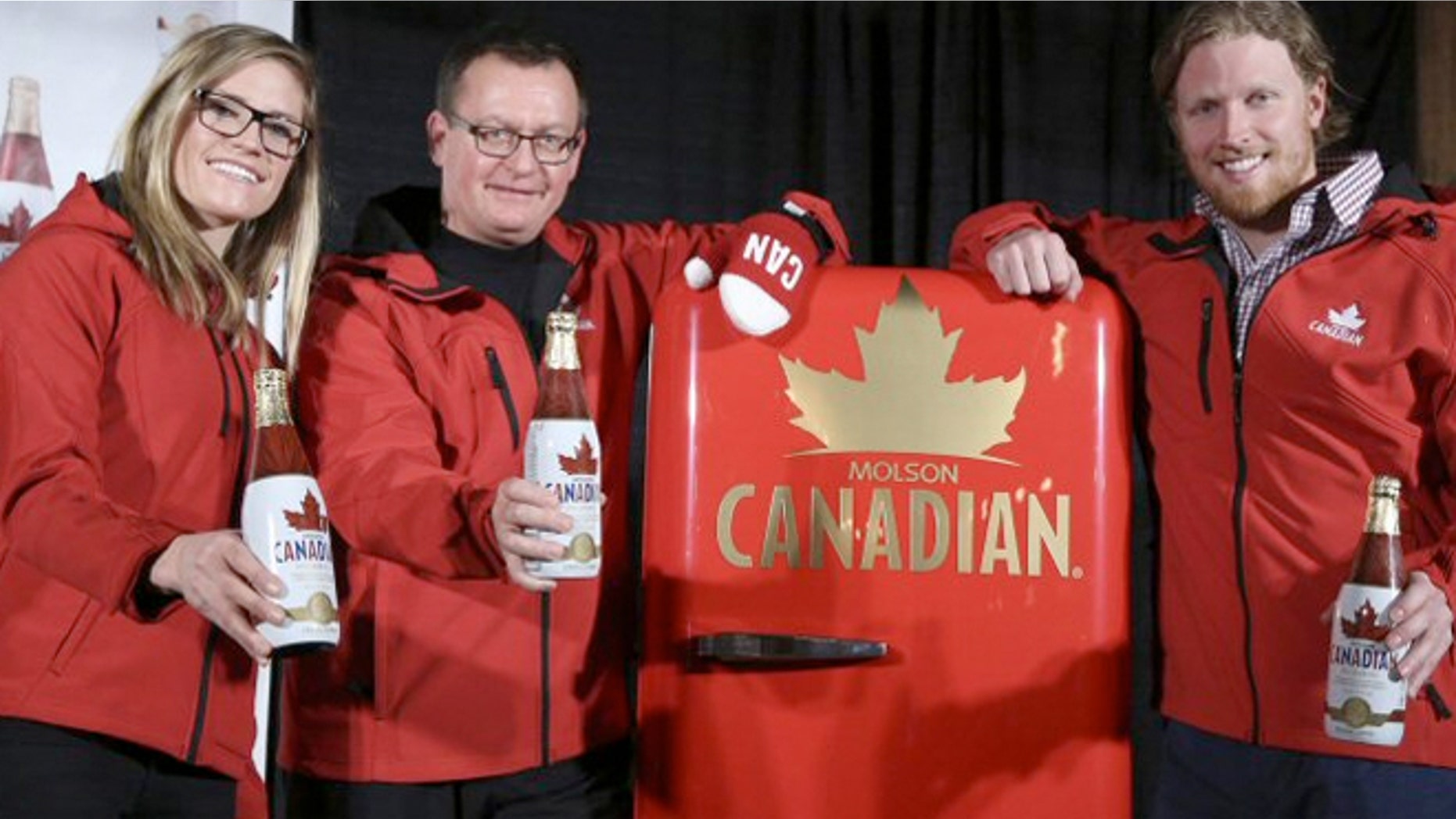 Ferg Devins of Molson Coors Canada (center) with Canadian Olympic hopefuls Georgia Simmerling (left) and Cody Sorensen.