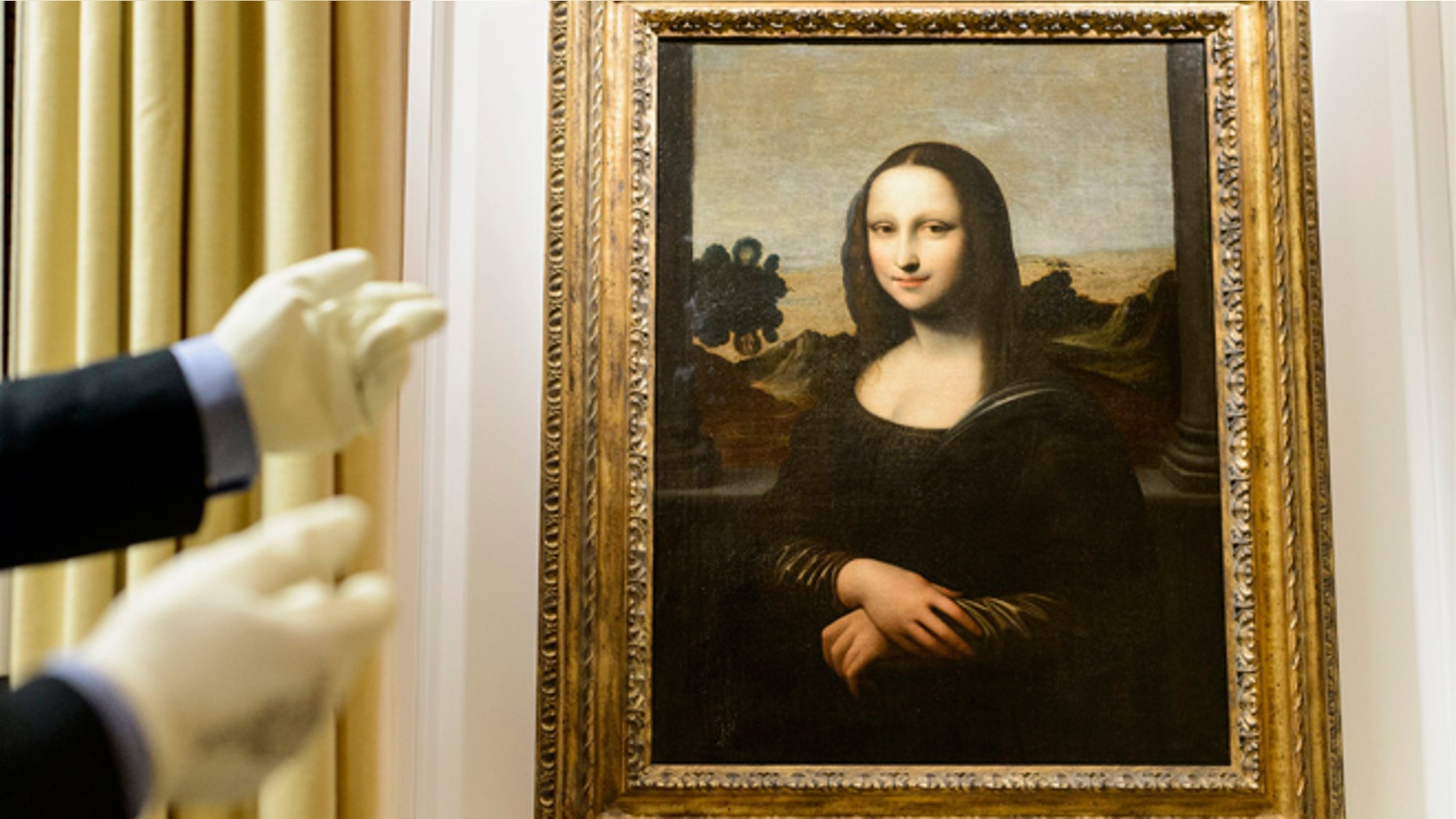 Sept. 26, 2012: A painting attributed to Leonardo da Vinci and representing Mona Lisa is seen during a preview presentation in a vault in Onex near Geneva.