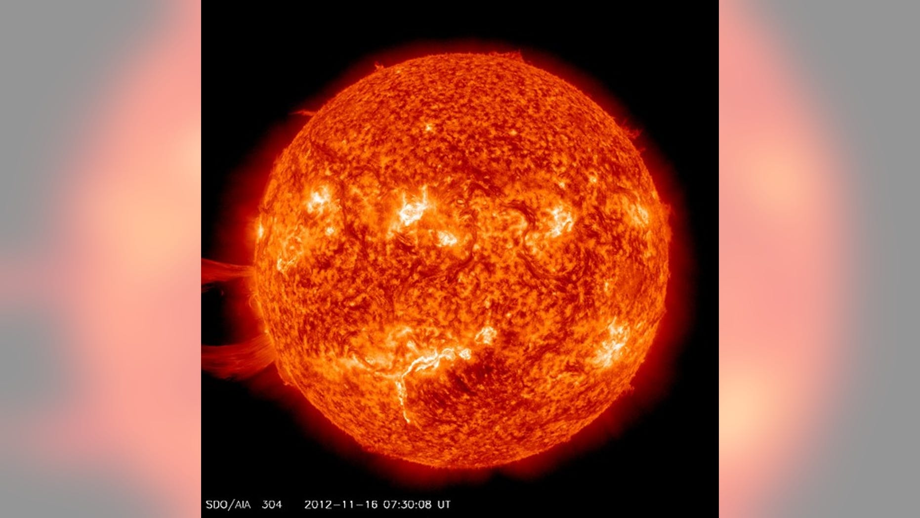 A giant solar prominence erupts from the sun on Nov. 16, 2012, in this image captured by NASA's sun-watching Solar Dynamics Observatory. The solar eruption was not aimed at Earth.