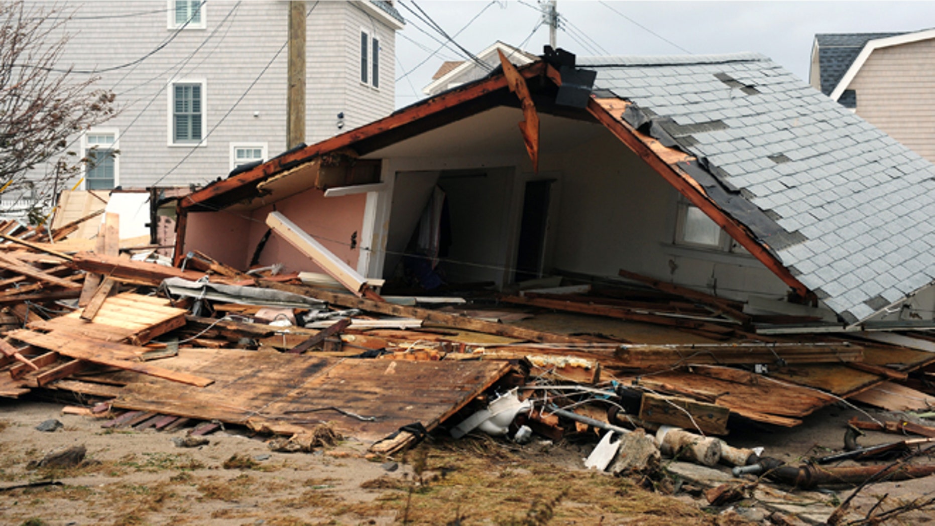 FILE: Oct. 30, 2012: Debris is scattered amidst storm damage from Sandy in Fairfield, Conn.