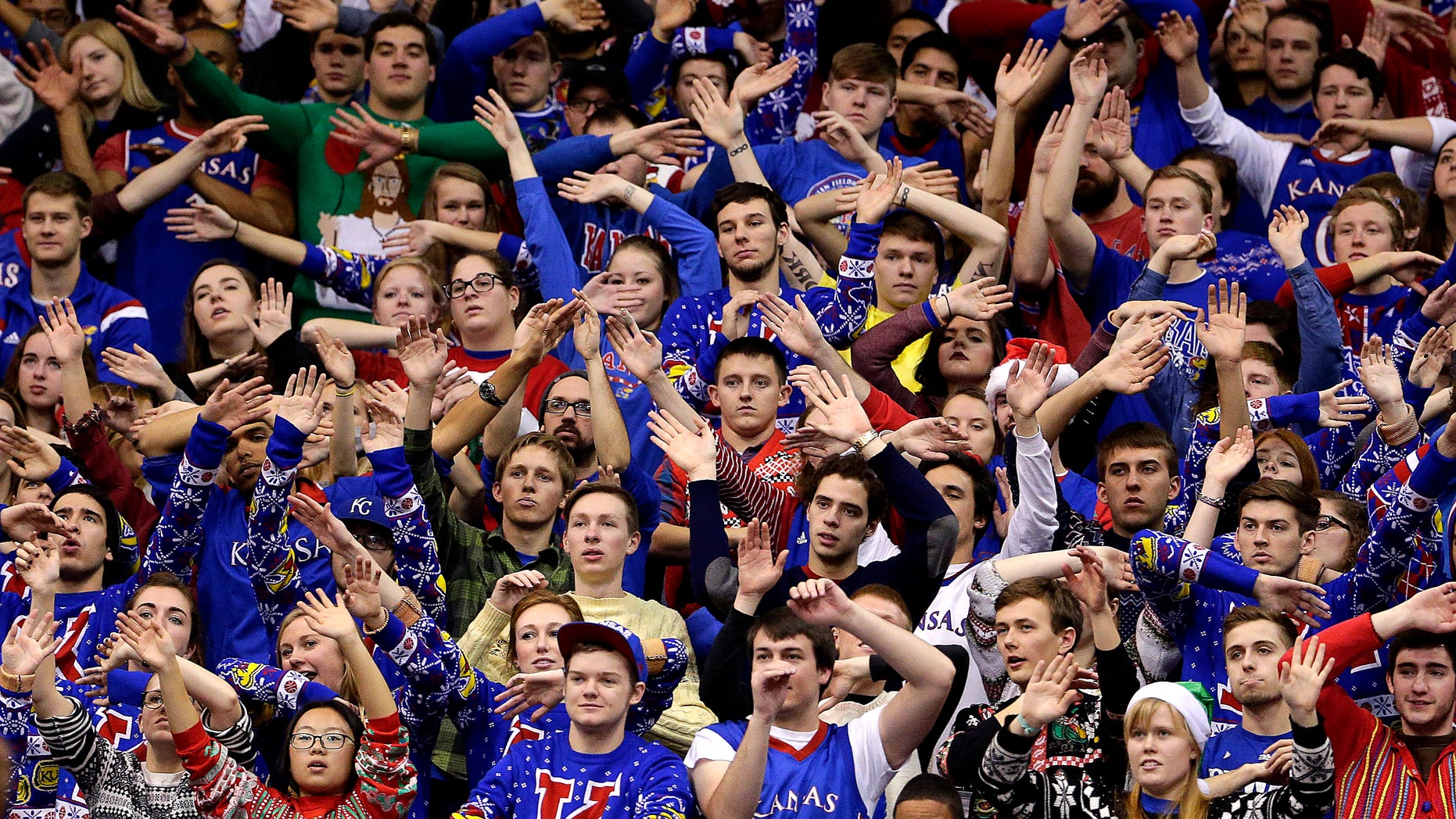 Dec. 19, 2015: Kansas fans cheer during the first half of a game against Montana.