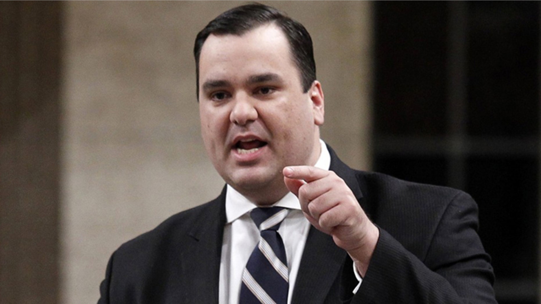James Moore, the heritage minister in Canada, told Library and Archives of Canada to show “Iranium,” despite threats of violence leveled at the institution