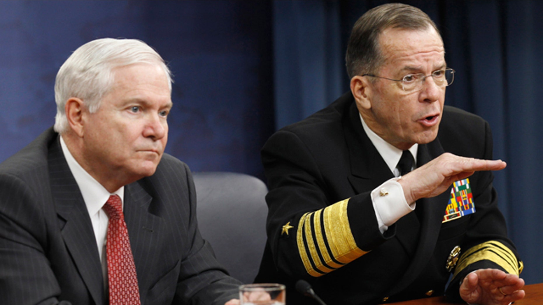 March 1, 2011: Defense Secretary Robert Gates, left, and Joint Chiefs Chairman Adm. Mike Mullen take part in a news conference at the Pentagon.