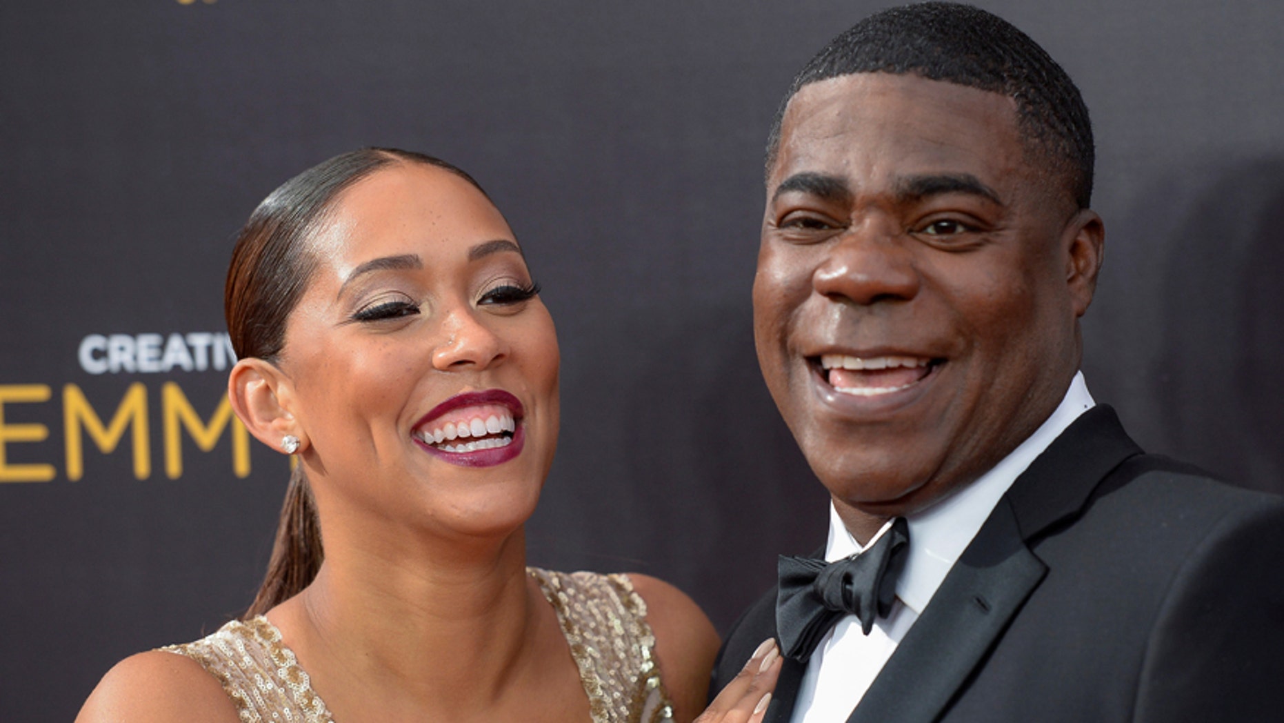 Morgan and wife actress Megan Wollover arrive at the Creative Arts Emmys