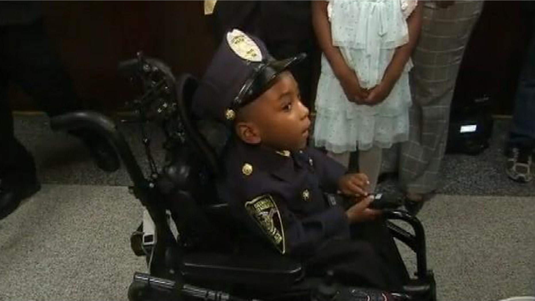 Dec. 2, 2013: Morgan Steward, 5, is sworn in as a honorary police officer in Covington, Ga.