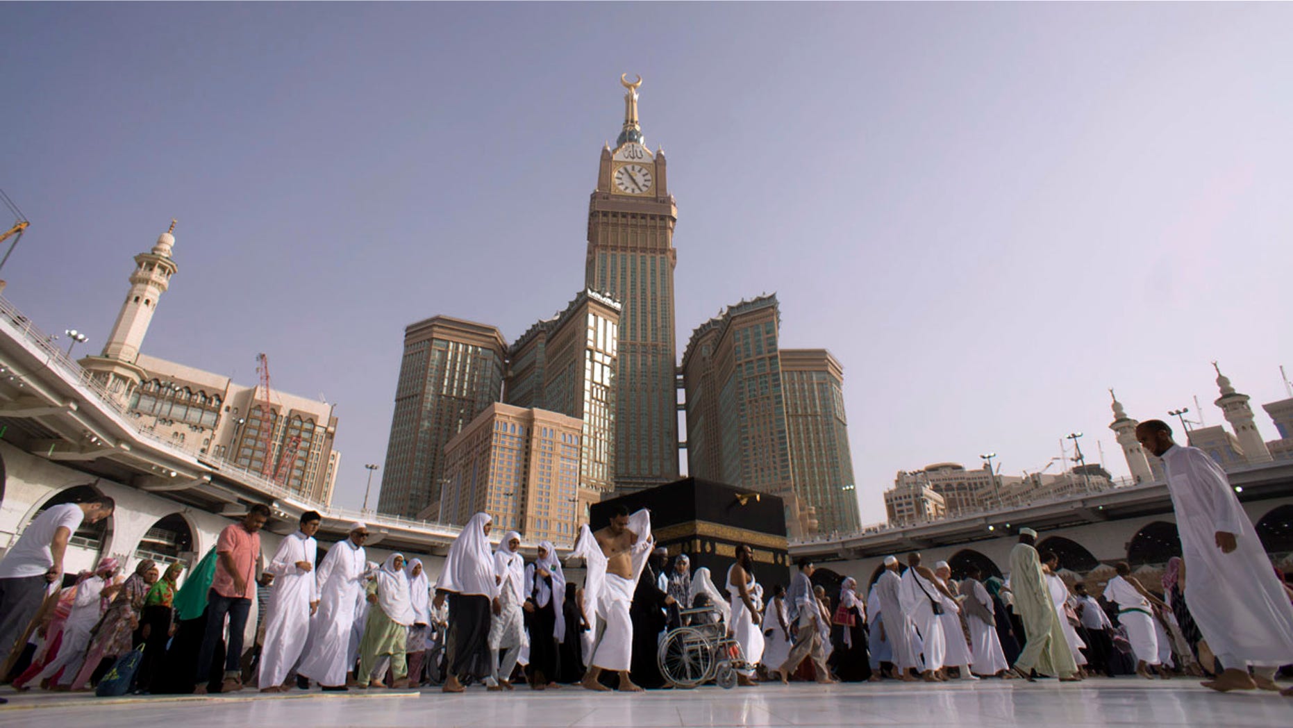 Muslim pilgrims walk around the Kaaba, the cubic building at the Grand Mosque, during the minor pilgrimage, known as Umrah, in the Muslim holy city of Mecca, Saudi Arabia on May 4.