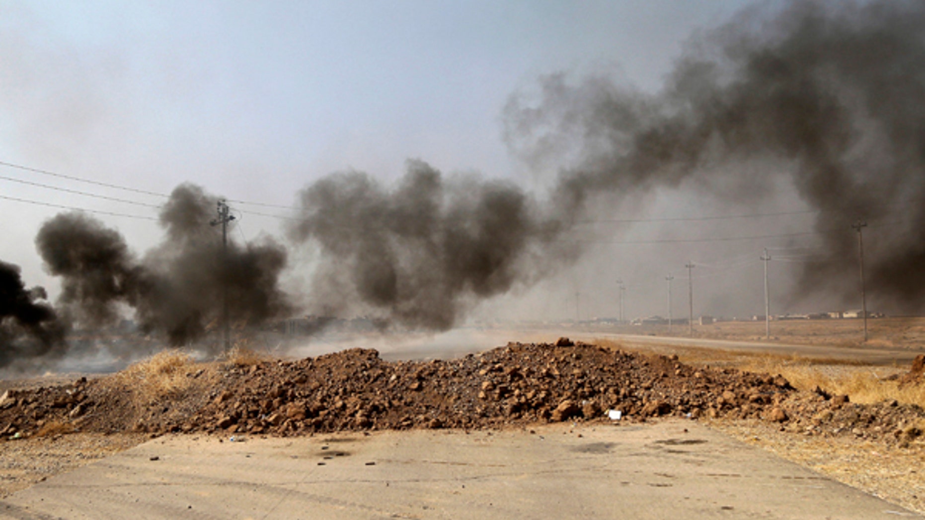 Smoke rises from Islamic state positions after an airstrike by coalition forces in villages surrounding Mosul.