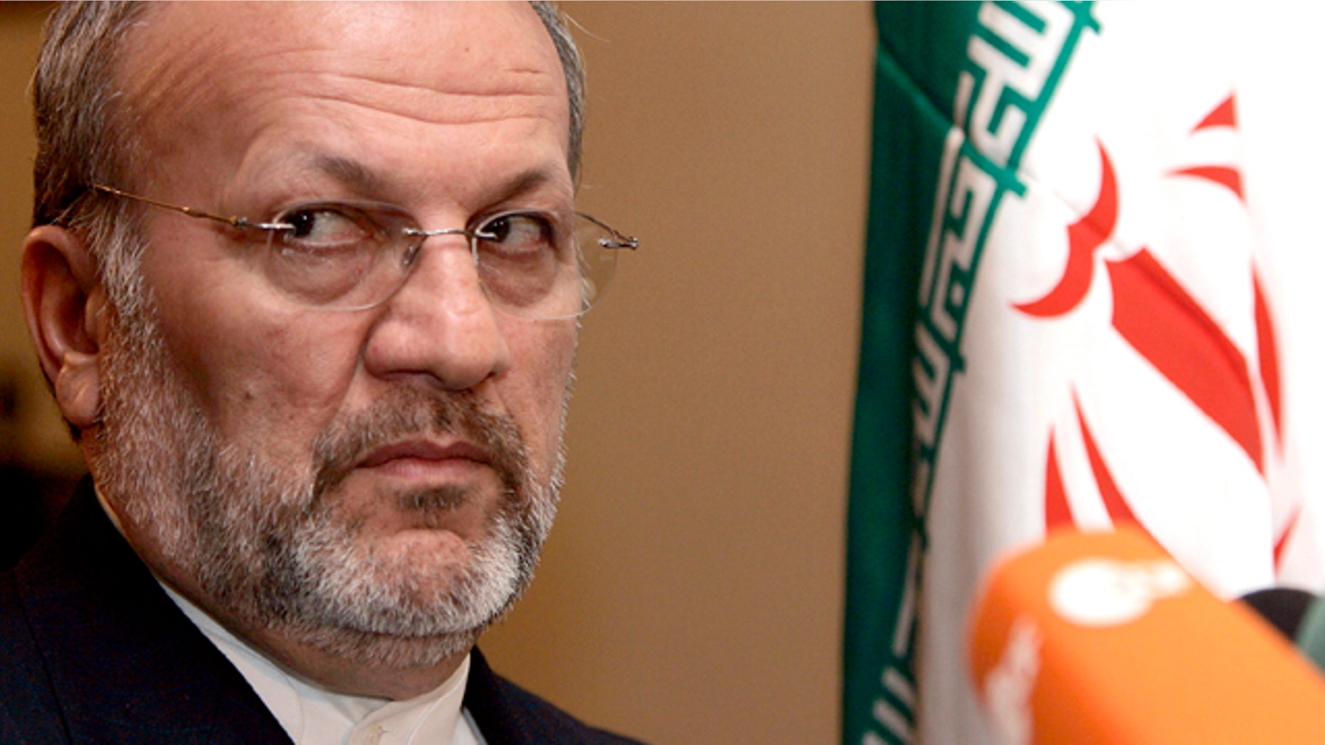 Feb. 20, 2006: Iran's Foreign Minister Manouchehr Mottaki listens to questions from journalists during a media conference at the Iranian Embassy in Brussels. Iranian President Mahmoud Ahmadinejad fired his foreign minister Monday as he was in the middle of an official visit to Africa and named the nuclear chief to serve as the country's acting top diplomat. (AP)