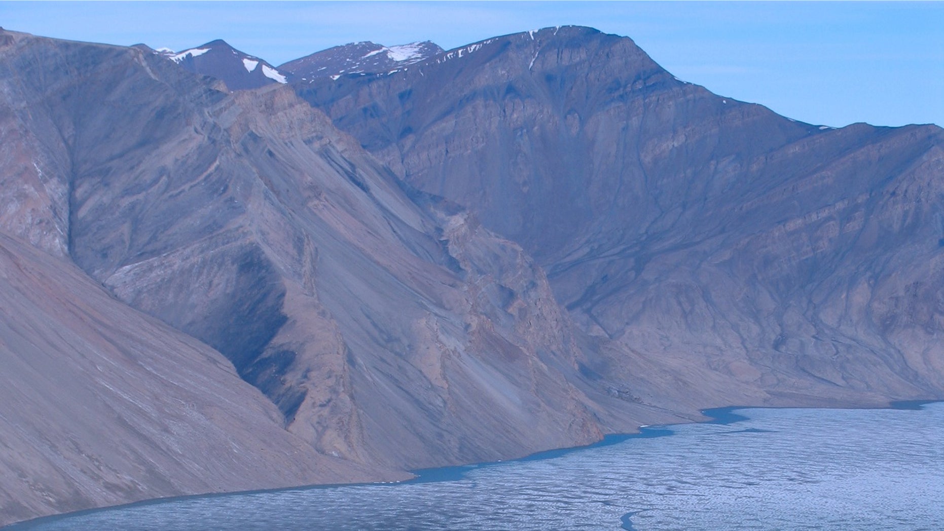 The shores of Buchanan Lake, Axel Heiberg Island, Nunavut, where researchers have discovered sediments deposited shortly after the worst extinction event in Earth's history.