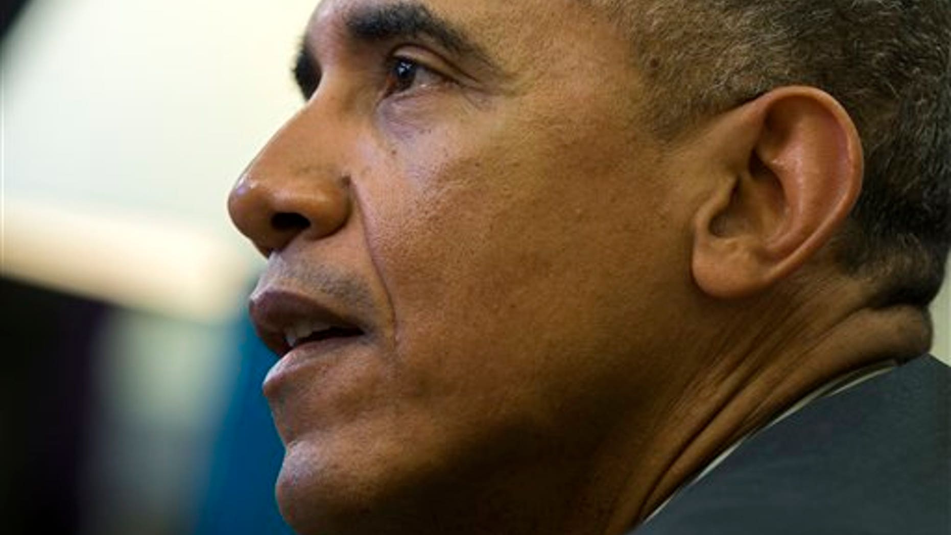 President Barack Obama meets with a group of immigration advocates in the Oval Office of the White House in Washington, Wednesday, Feb. 4, 2015. (AP Photo/Evan Vucci)
