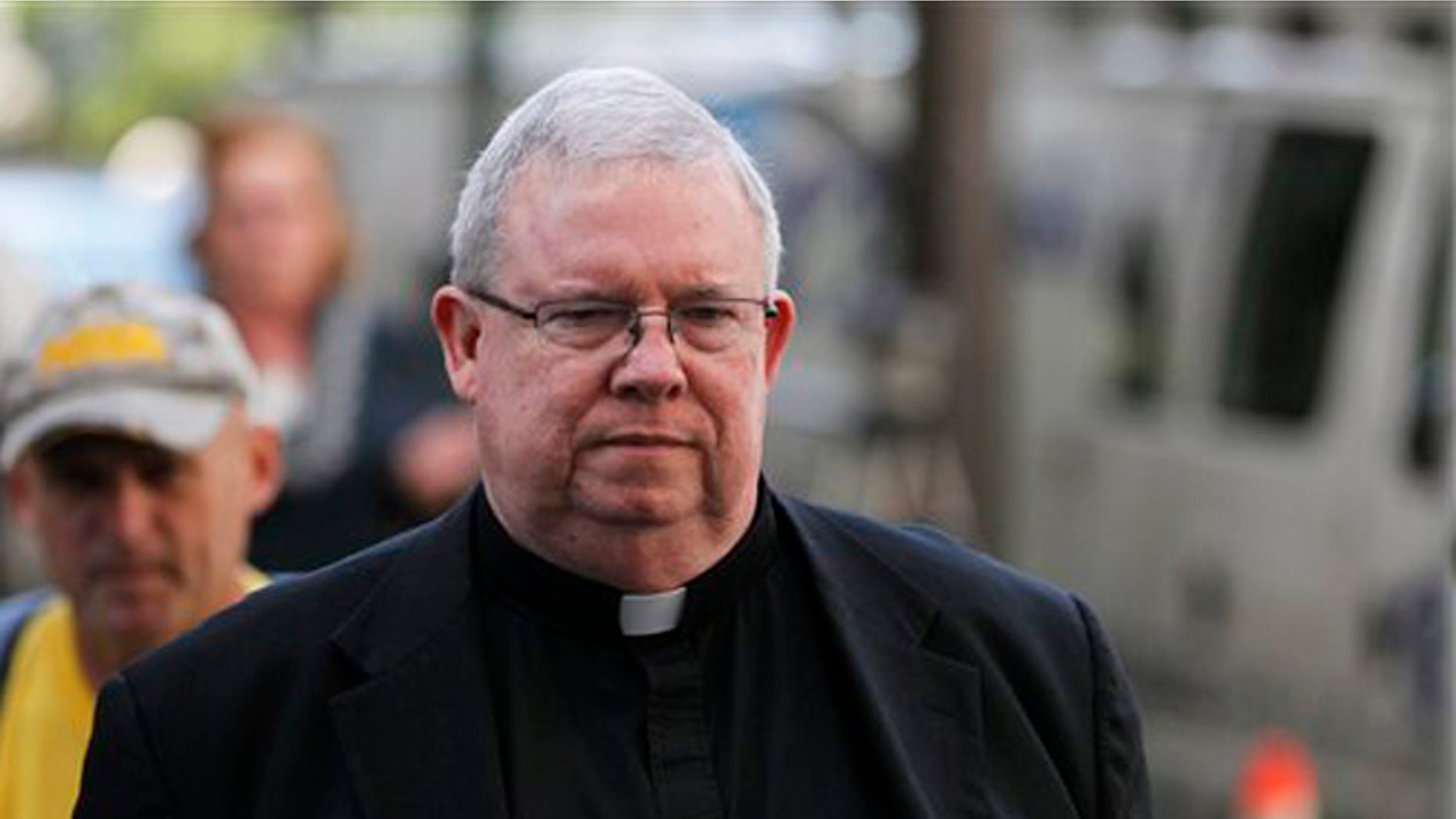 June 15, 2012: Monsignor William Lynn walks to the Criminal Justice Center in Philadelphia.
