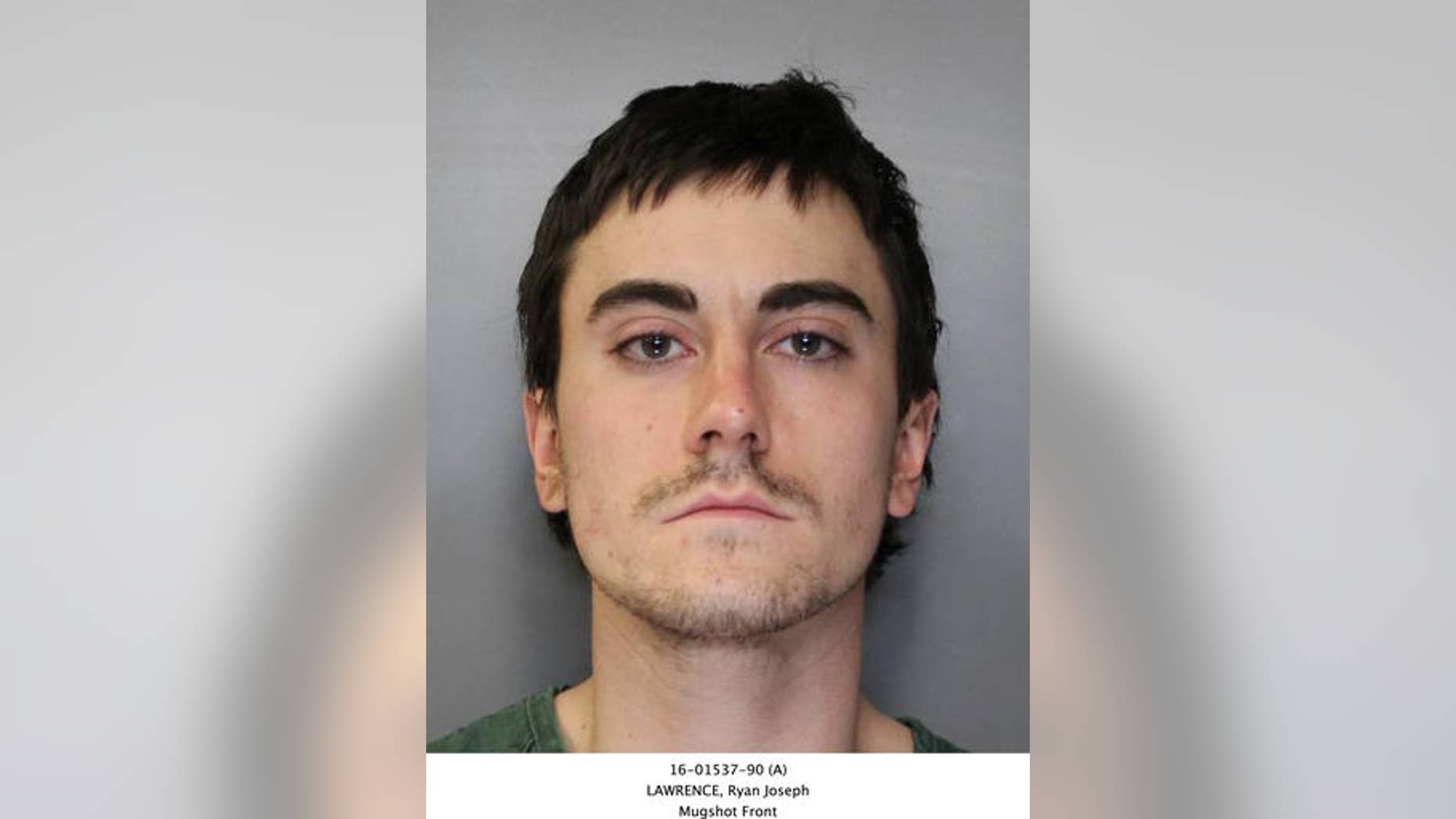 This booking photo provided by the Syracuse, N.Y., Police Department shows Ryan Lawrence, who is charged in the death of his 21-month-old daughter Maddox Lawrence.