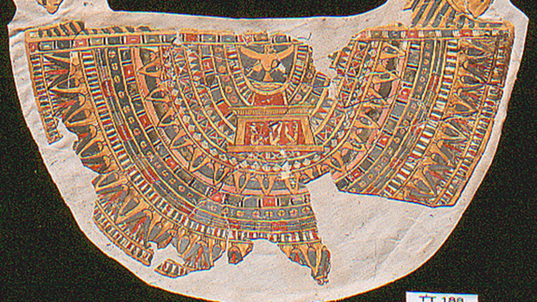 This 2,300-year-old collar, which was worn by a mummy, was discovered in fragments in a tomb in Thebes. The falcons in the top corners signify the god Horus, while the "Ba-bird" at top center represents the immortal soul of the deceased mummy.