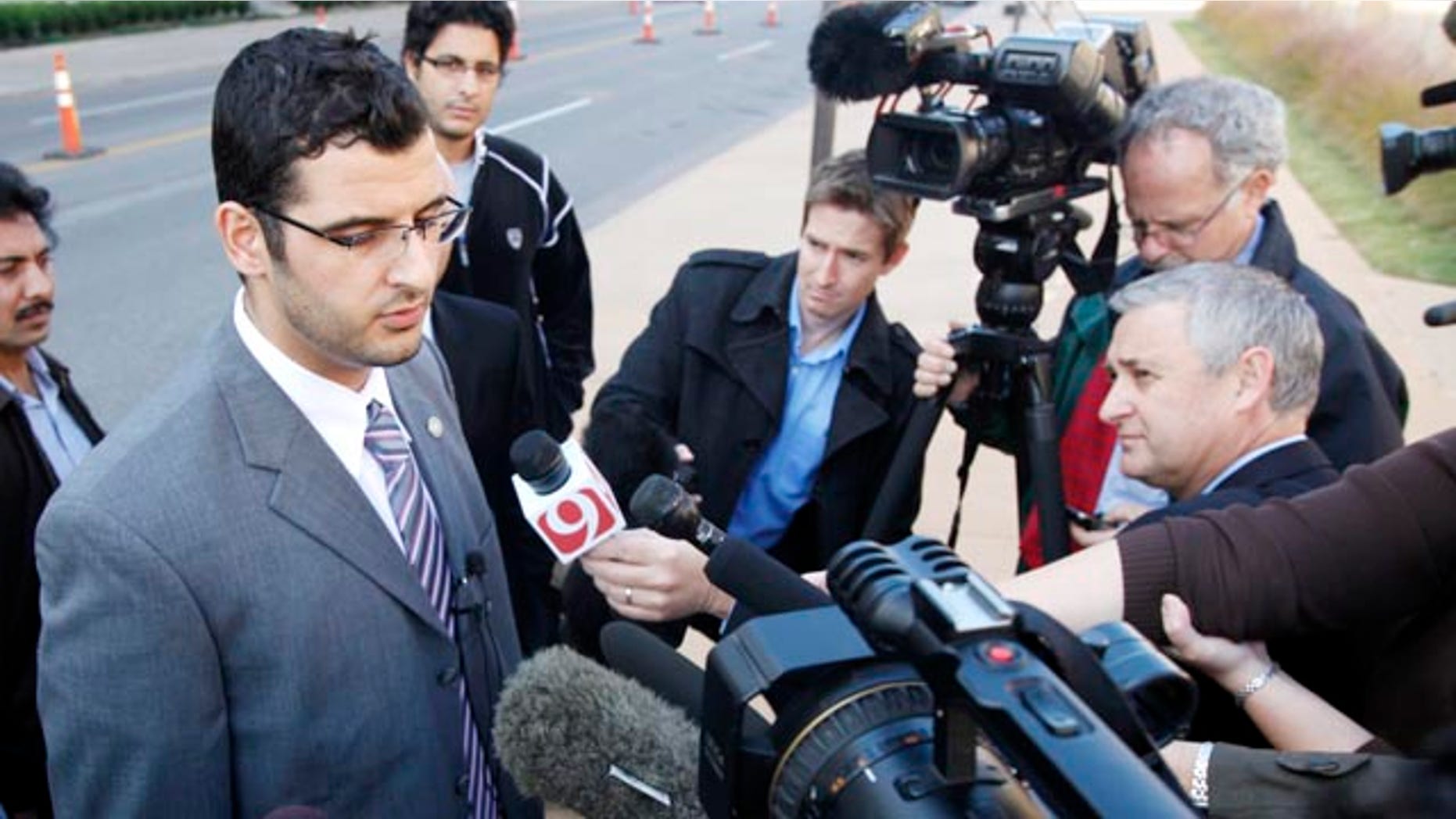 Nov. 8: Muneer Awad, executive director of Council on American-Islamic Relations in Oklahoma, talks to members of the media outside a Federal Courthouse in Oklahoma City. A federal judge in Oklahoma will decide whether to block a constitutional amendment that prohibits state courts from considering international or Islamic law when deciding cases.