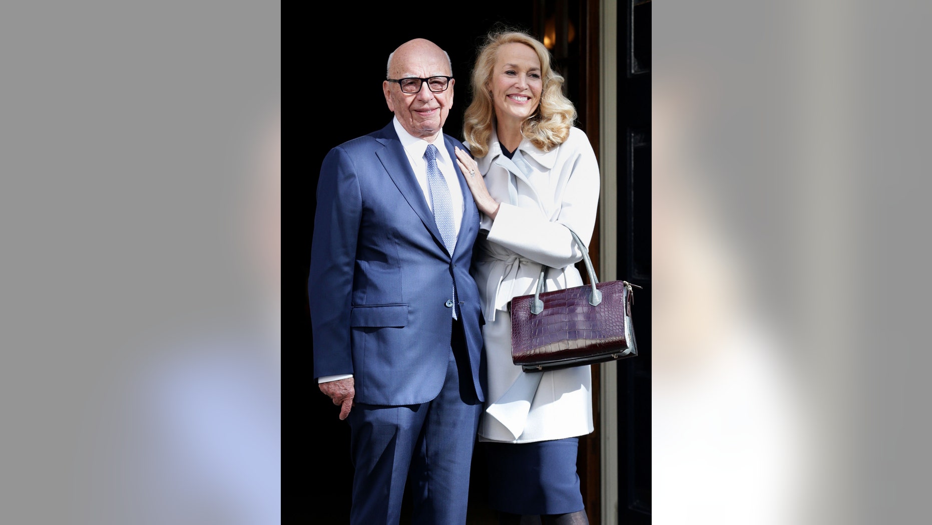 News Corp Executive Chairman Rupert Murdoch and Jerry Hall leave Spencer House, London, after getting married, Friday March 4, 2016. (Yui Mok/PA via AP) UNITED KINGDOM OUT NO SALES NO ARCHIVE