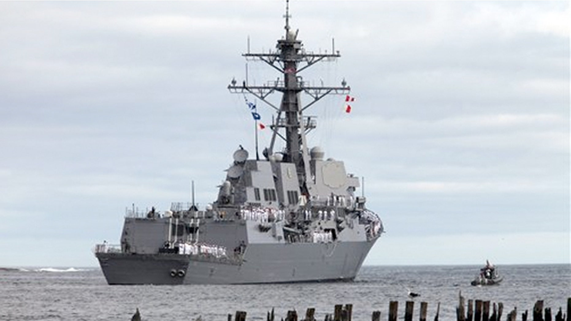 The Michael Murphy, the last of the U.S. Navy's original run of Arleigh Burke destroyers, heads down the Kennebec River off of Phippsburg, Maine, Wednesday, Sept. 5, 2012.