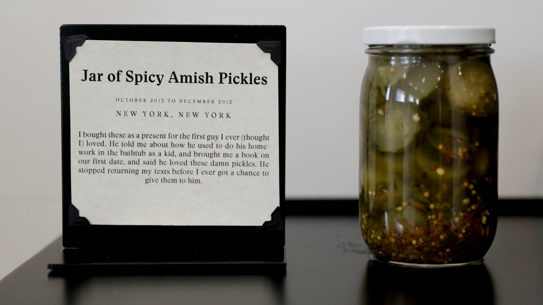 A jar of pickles purchased for a first love is displayed at the new Museum of Broken Relationships.