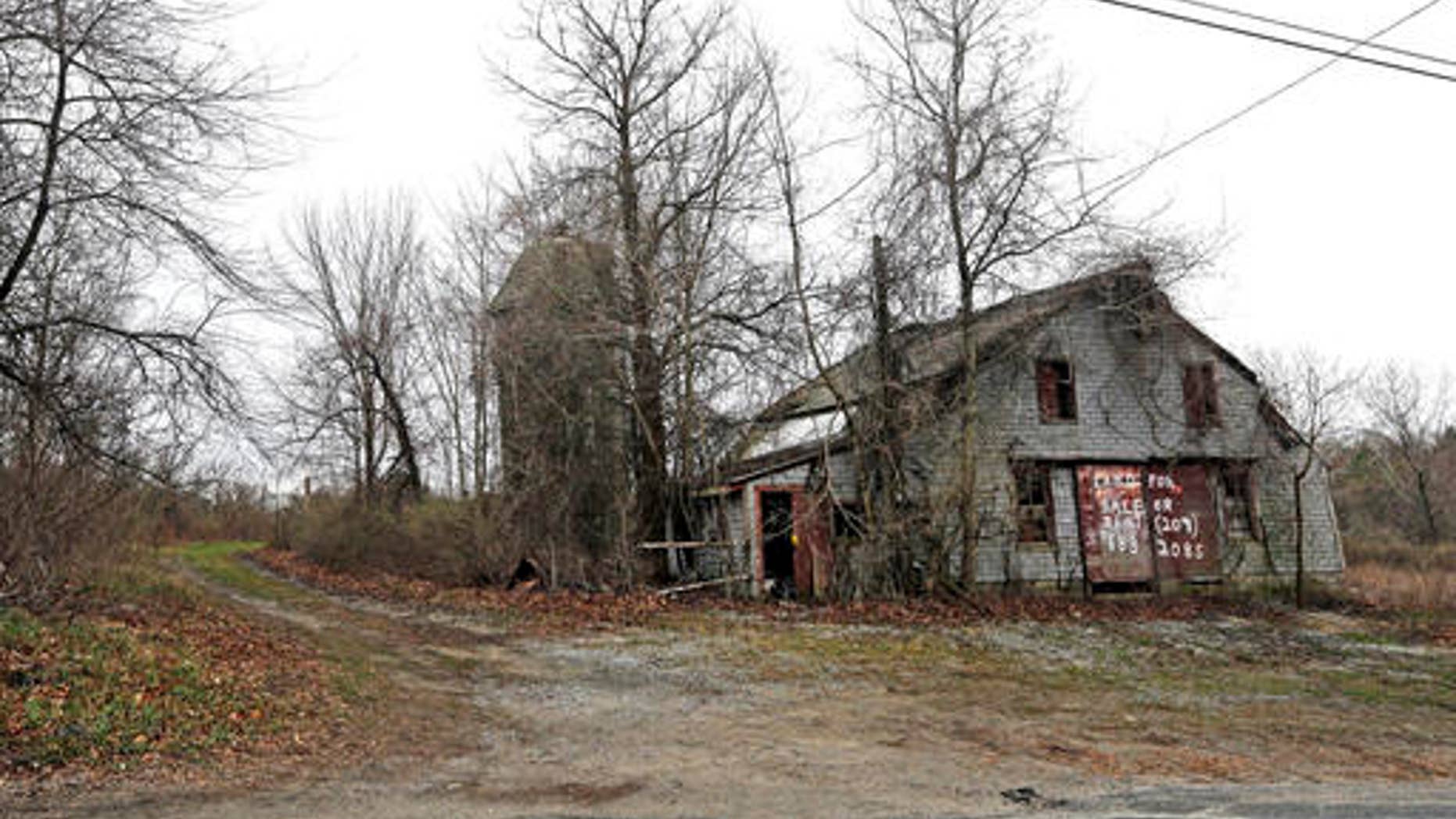 An old barn stands on land in Dudley, Mass., at the site of the proposed Muslim cemetery.