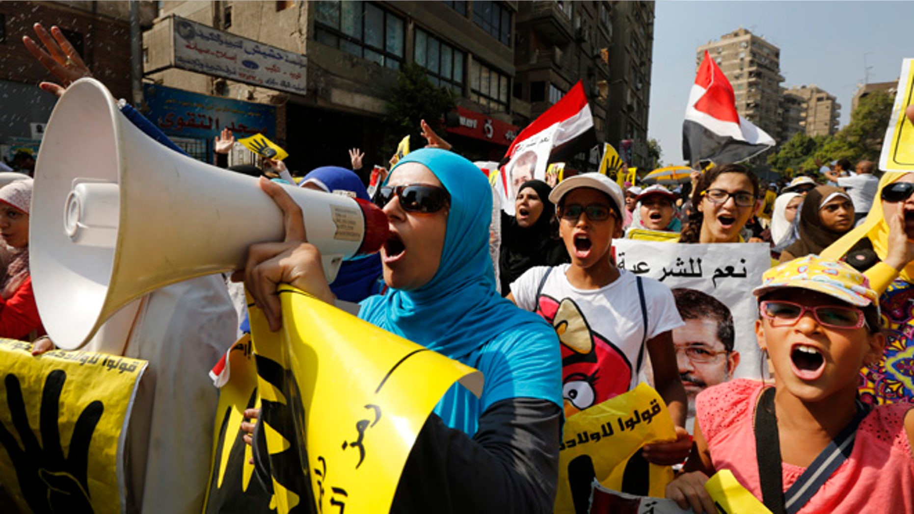 Sept. 6, 2013: Supporters of the Muslim Brotherhood chant slogans as they march in Cairo, Egypt.
