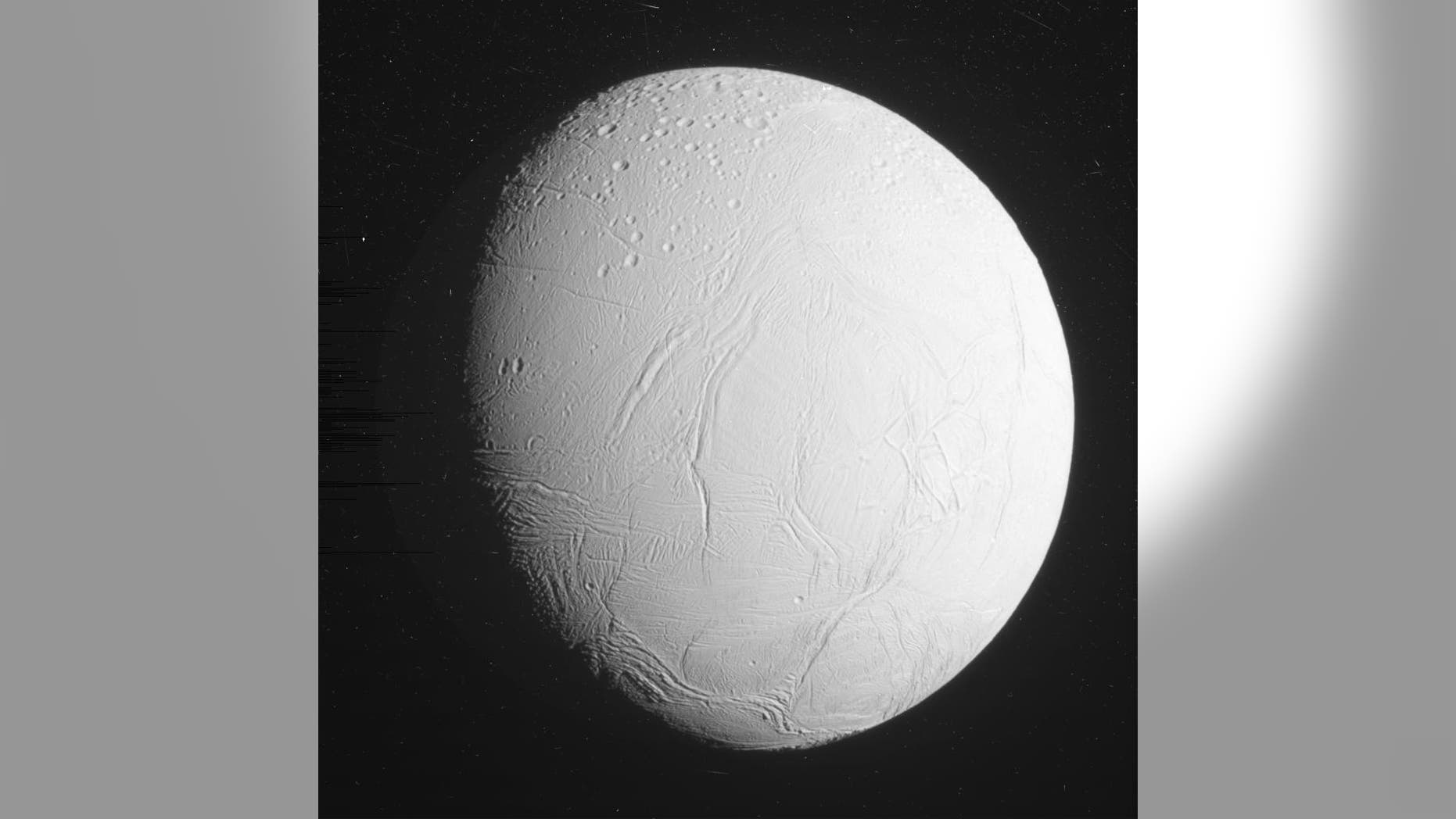 This unprocessed view of Saturn's moon Enceladus was acquired by NASA's Cassini spacecraft during a close flyby of the icy moon on Oct. 28, 2015. (NASA/JPL-Caltech/Space Science Institute)