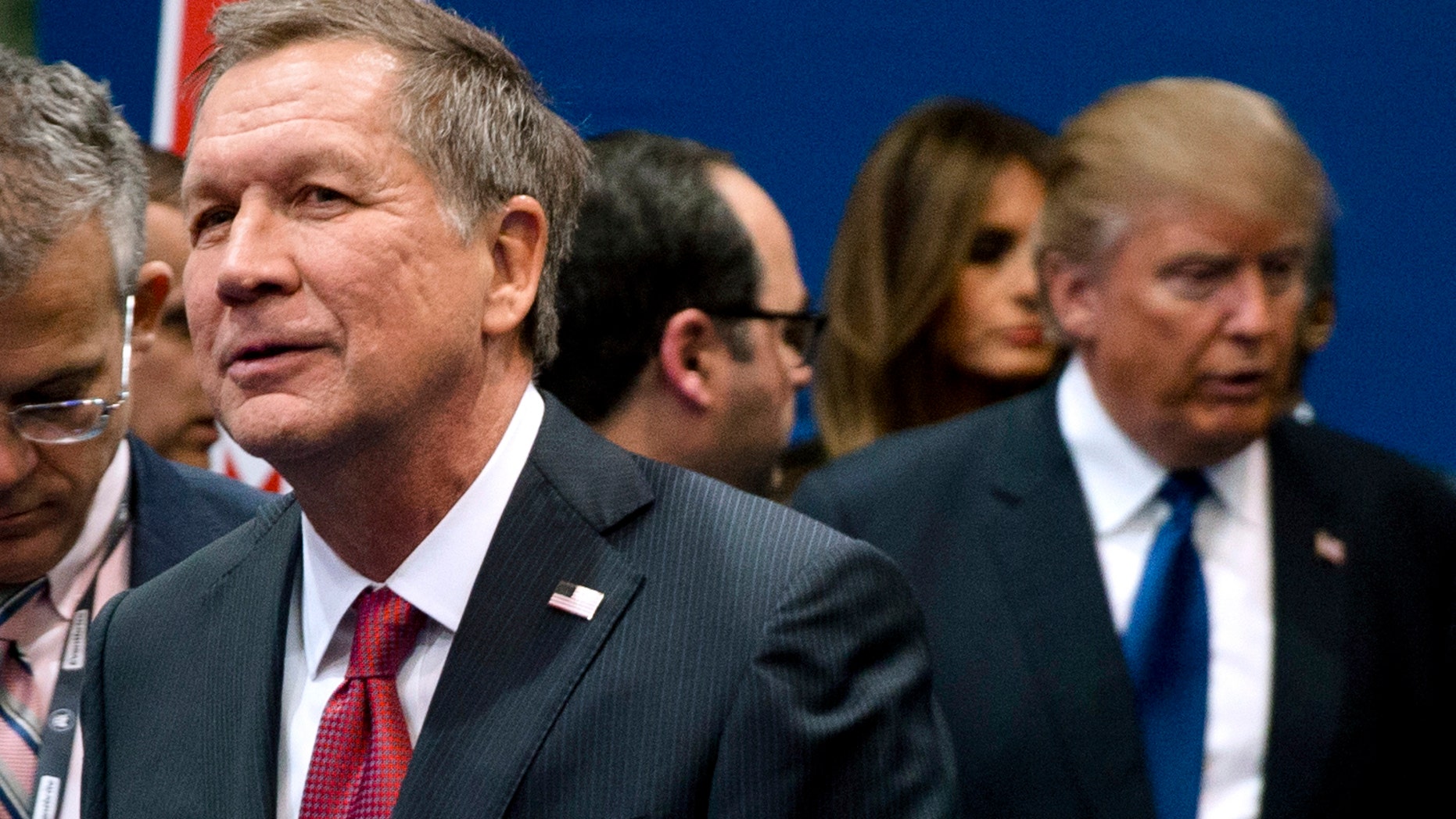 Feb. 6, 2016: Ohio Gov. John Kasich, left, and Donald Trump, right, speak to reporters after a Republican presidential primary debate hosted by ABC News at Saint Anselm College in Manchester, N.H.