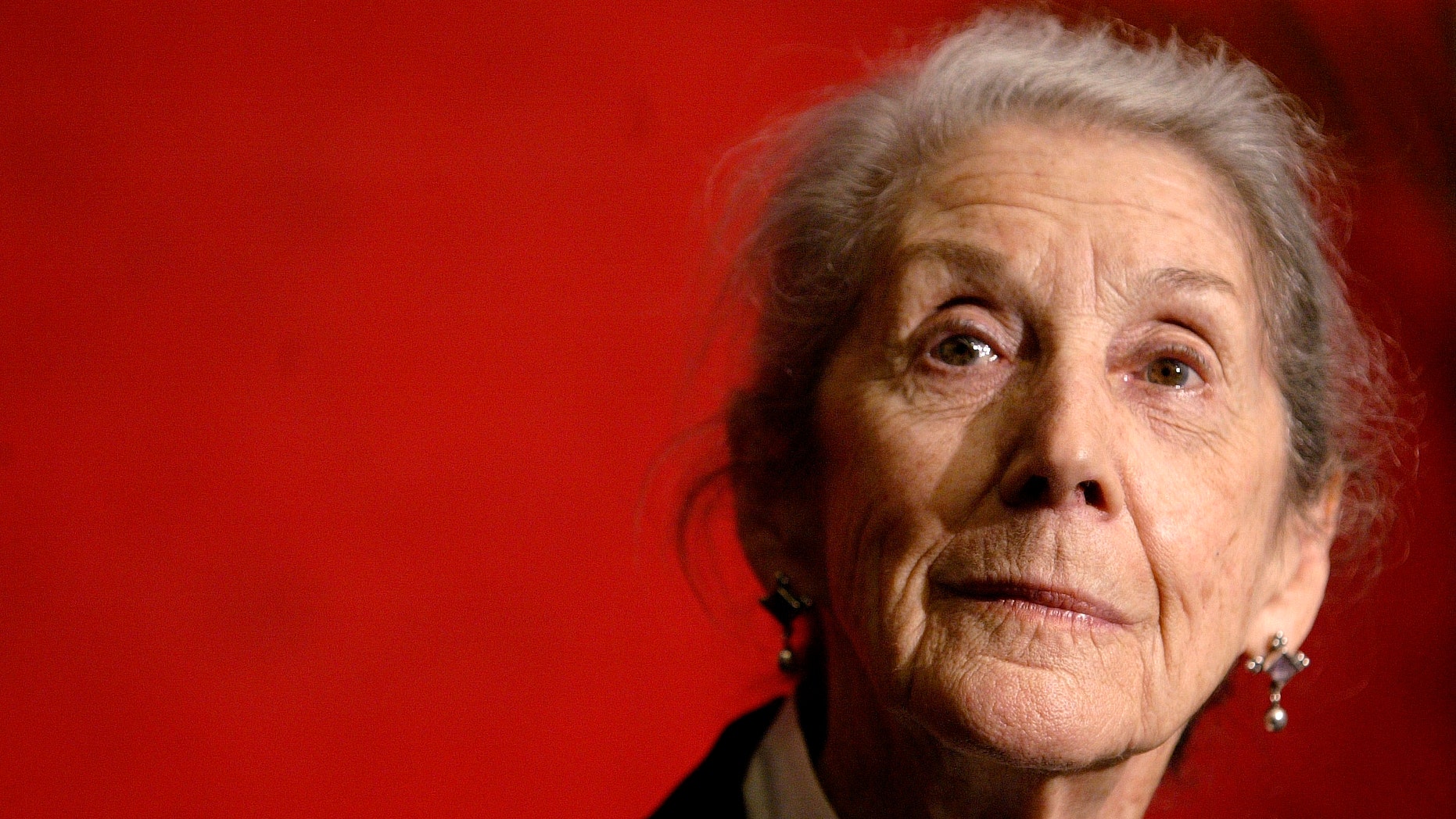FILE - This is a Sunday, Nov. 26, 2006 file photo of Nobel Prize-winning author Nadine Gordimer, of South Africa, as she listens to a question during a news conference on the Guadalajara International Book Fair at Guadalajara's Expo in Mexico. Gordimer died in her sleep in Johannesburg, Sunday July 13, 2014, aged 90. (AP Photo/Guillermo Arias, File)
