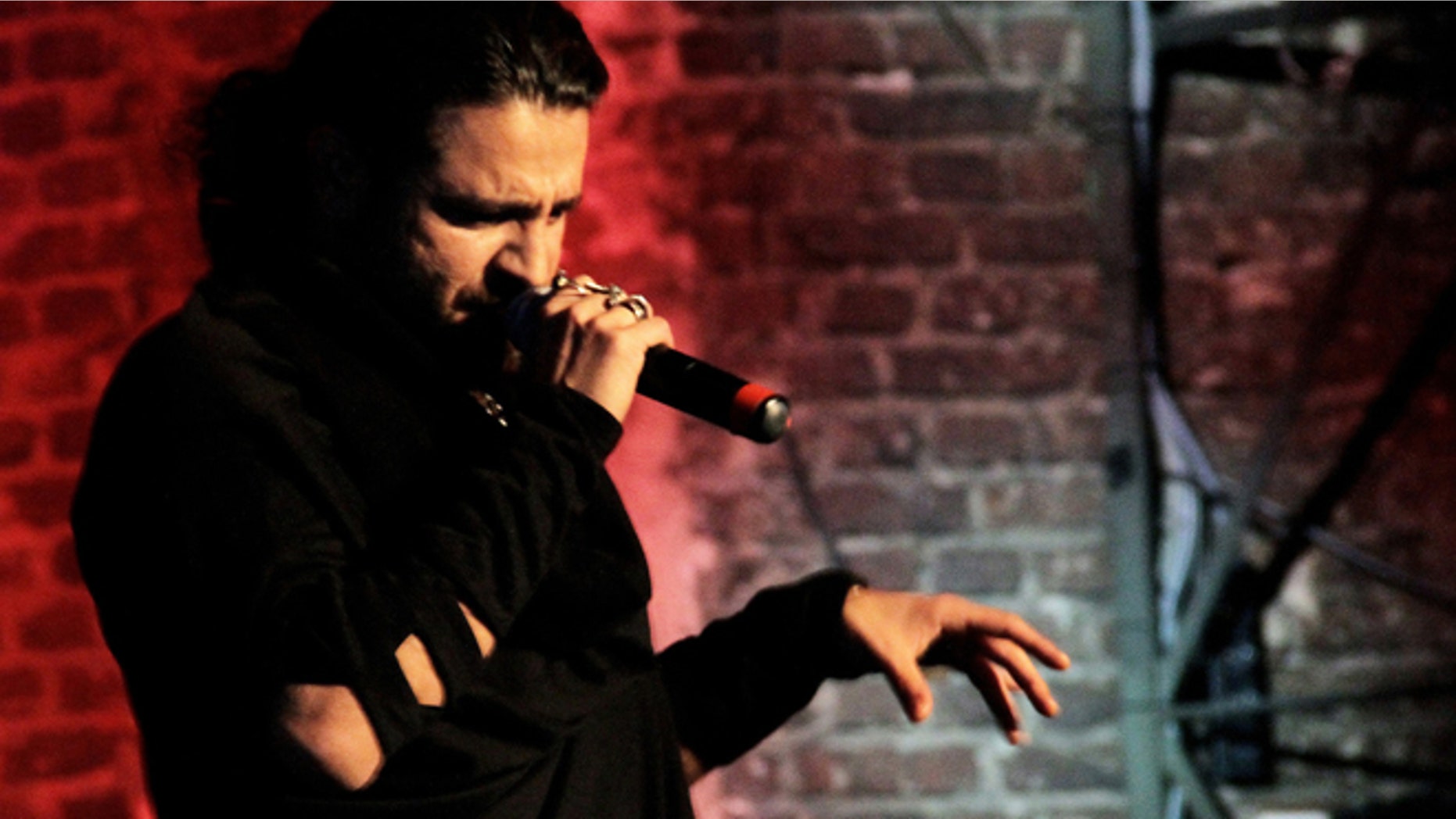 In this undated picture publicly provided by the Shahin Najafi managment, rapper Shahin Najafi performs in Duesseldorf , Germany.