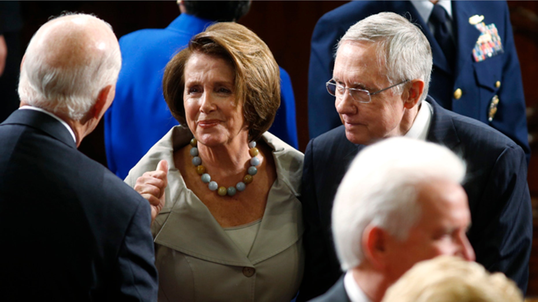In this Sept. 18, 2014 photo, House Minority Leader Nancy Pelosi, D-Calif., and U.S. Senate Majority Leader Harry Reid, D-Nev., shown entering the House chamber on Capitol Hill in Washington.