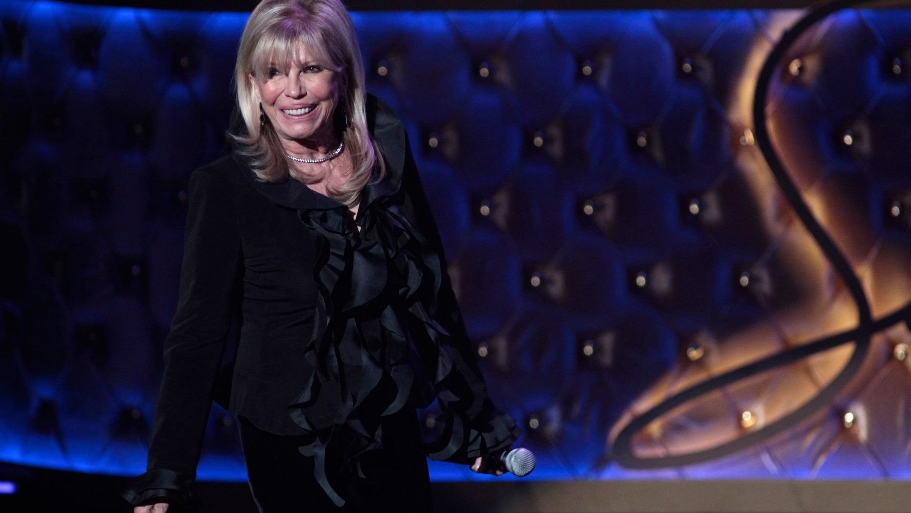 Singer Nancy Sinatra walks on stage during Sinatra 100 - An All-Star Grammy Concert in Las Vegas, Nevada December 2, 2015.