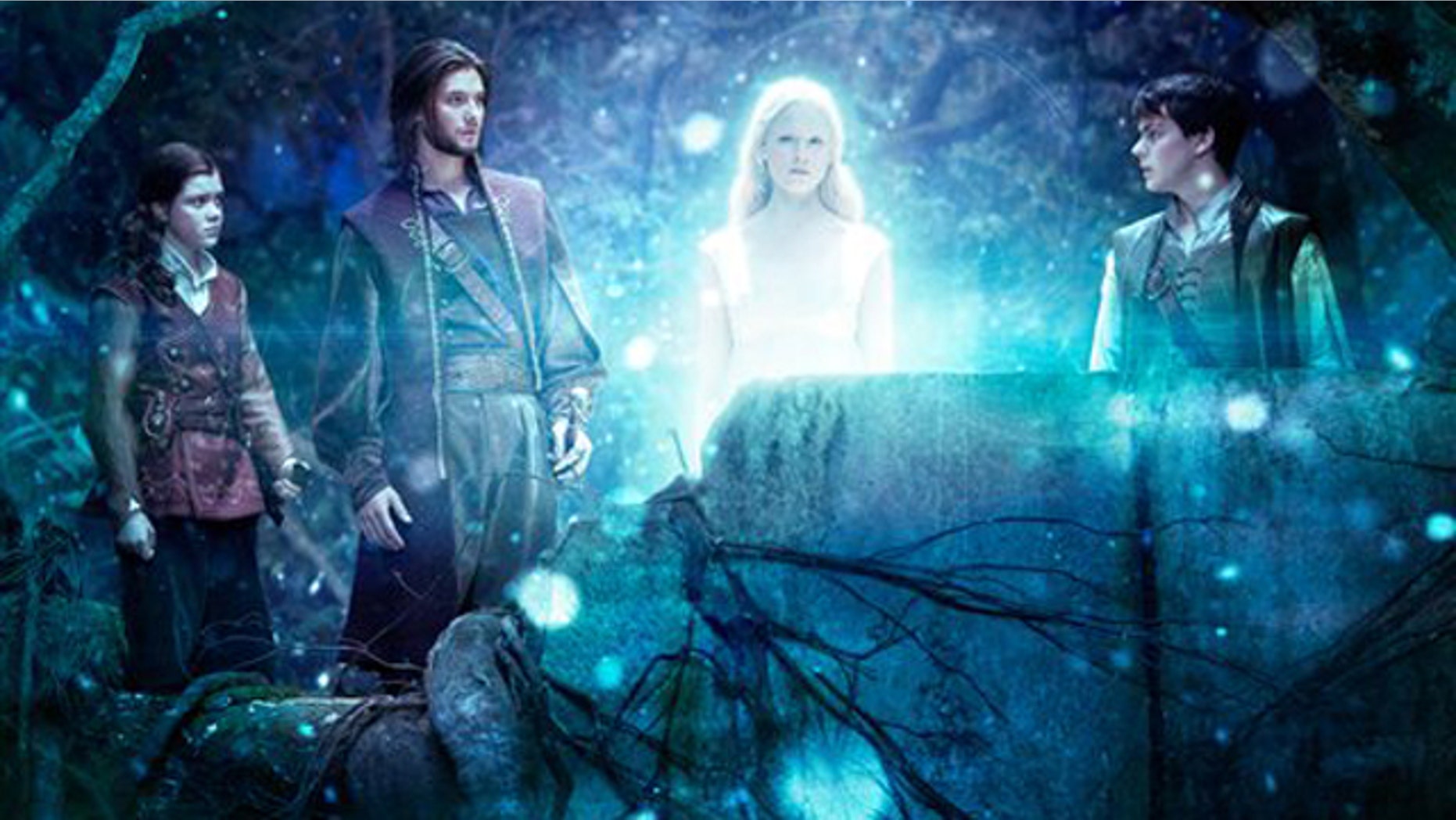 In this film publicity image released by 20th Century Fox, from left, Georgie Henley, Ben Barnes, Laura Brent, and Skandar Keynes are shown in a scene from The Chronicles of Narnia: The Voyage of the Dawn Treader.