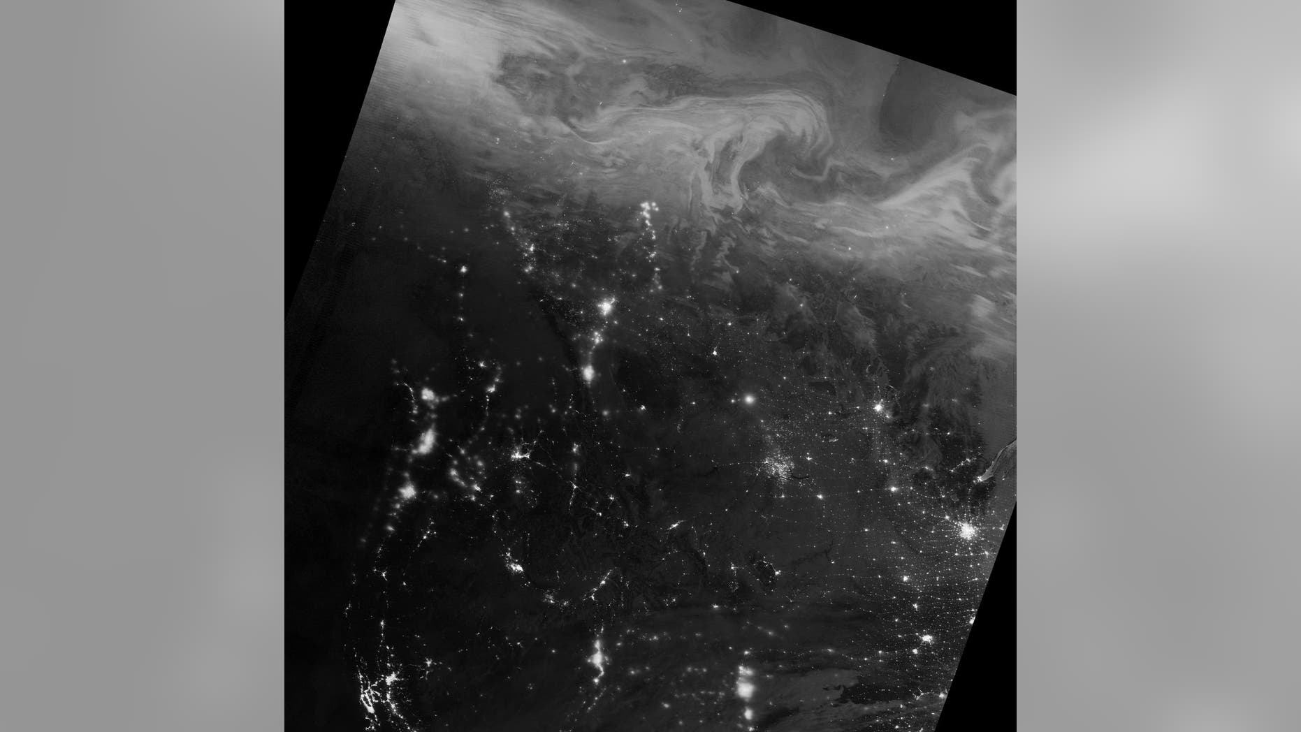The northern lights — the swirling, cloud-like features in this image — stretched across northern Canada during the nighttime hours of Dec. 22, 2016. (Credit: Jesse Allen / NASA Earth Observatory)